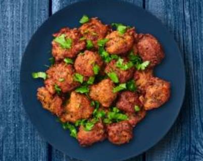 Order Golden Veggie Pakoras food online from Mad Over Curry store, Harrisburg on bringmethat.com