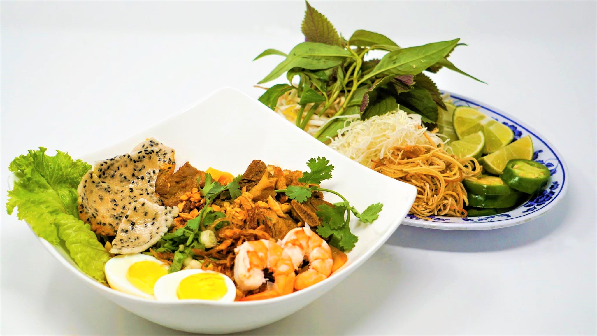 Order Shrimp, Pork, Egg Thick Yellow Noodle (Mi Quang Tom Thit) food online from Now Pho store, Denver on bringmethat.com