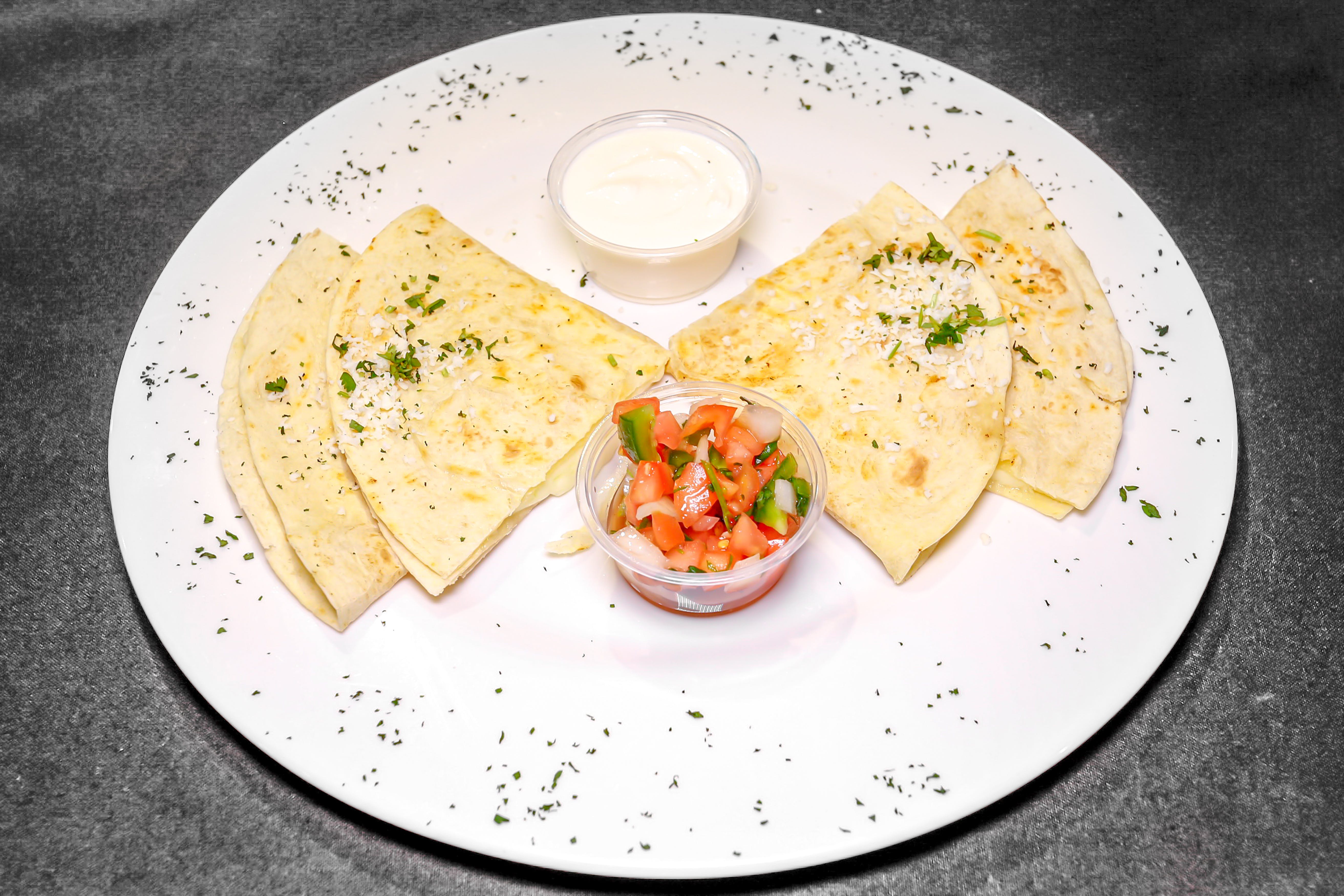 Order Cheese Quesadilla - 2 Pieces food online from Limeport Deli & Cafe store, Coopersburg on bringmethat.com