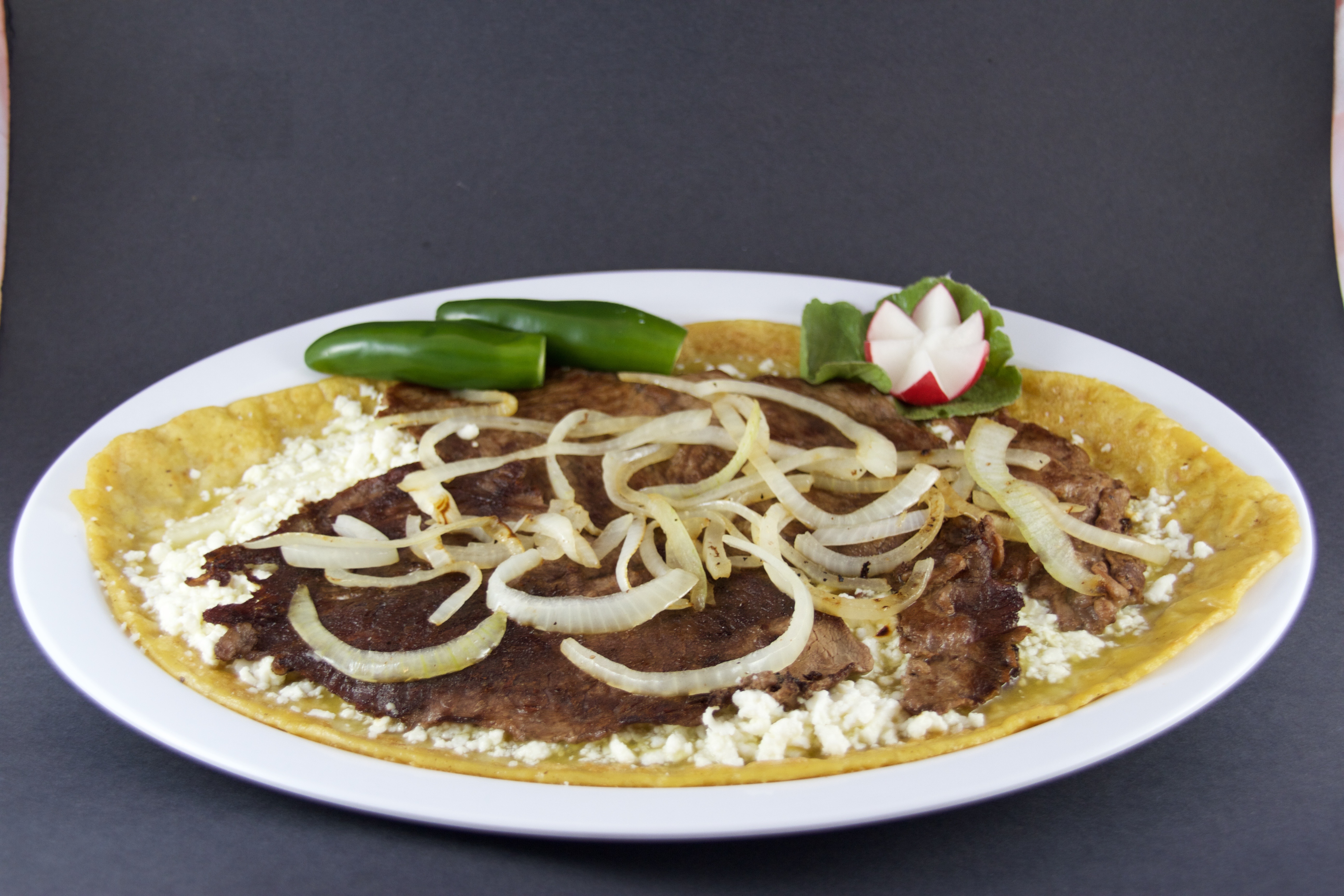 Order Bistec Huarache food online from Metro Balderas Restaurant store, Los Angeles on bringmethat.com