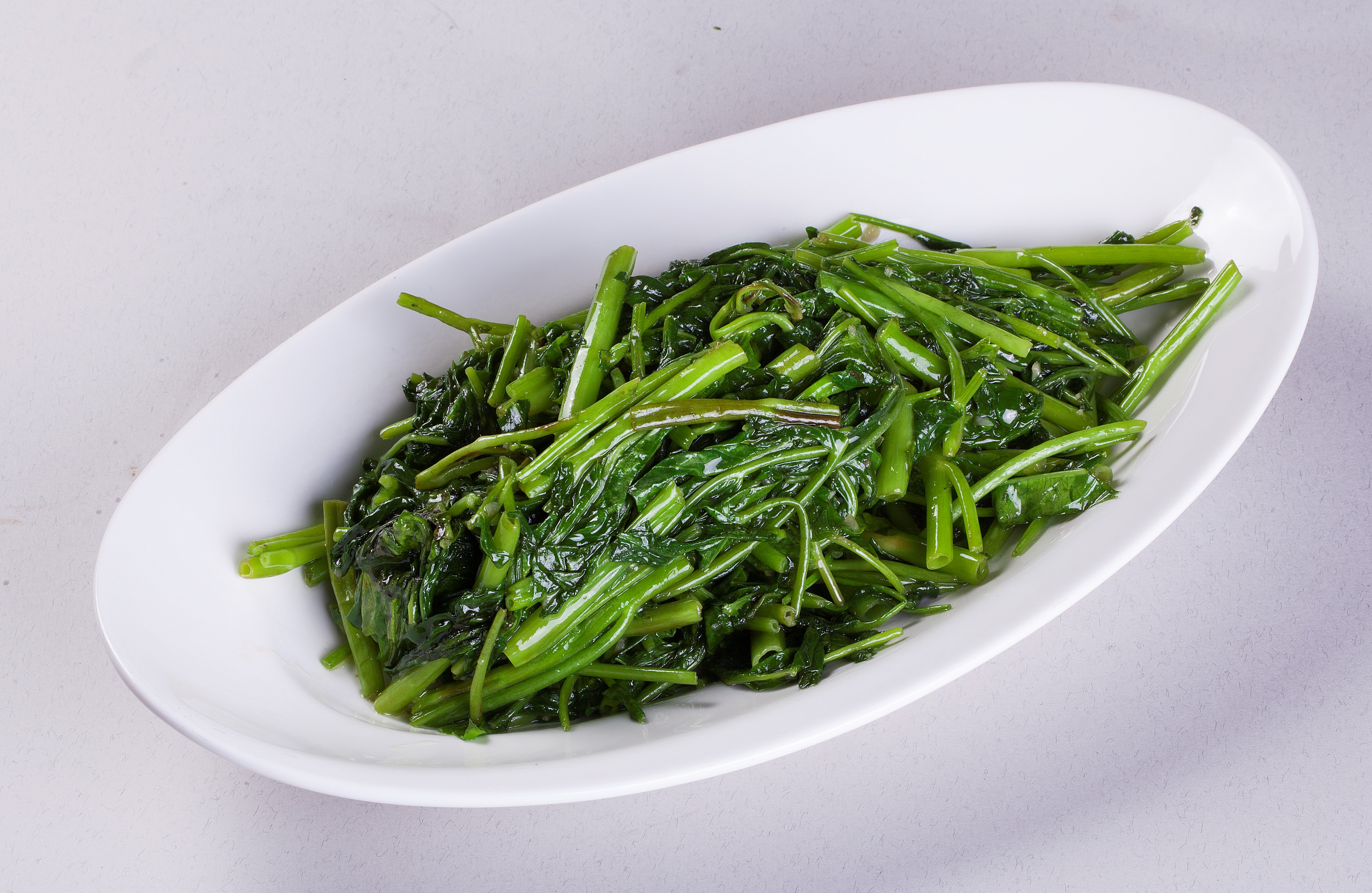 Order Stir-fried Water Spinach food online from Canaan Restaurant Chinese Cuisine store, West Covina on bringmethat.com