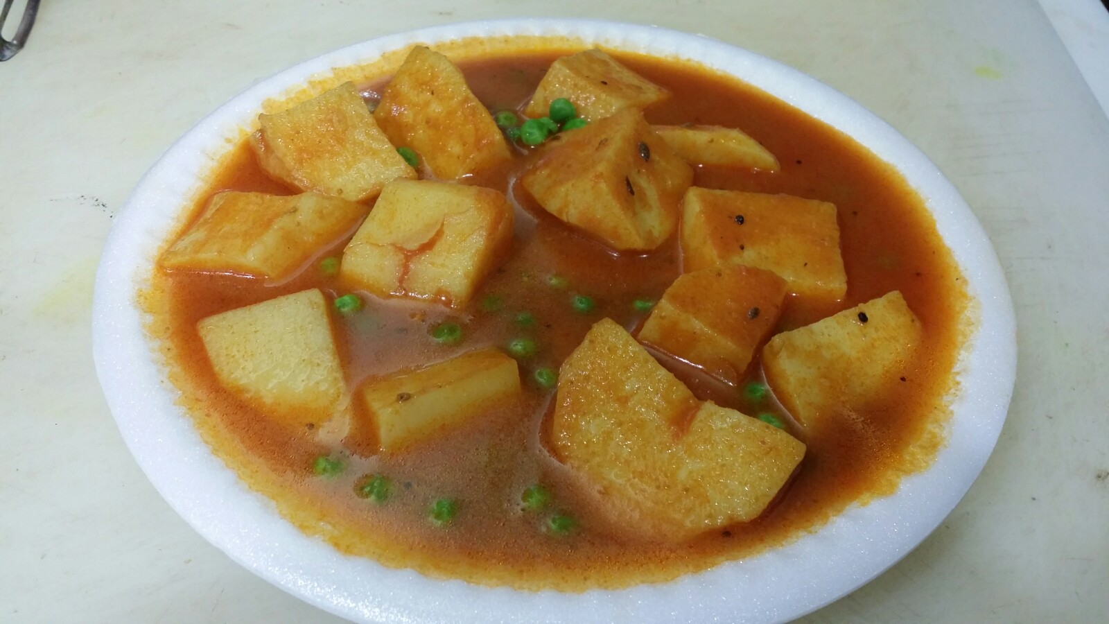 Order Aloo Mattar (Vegetarian Dish) food online from Golden Indian Grill & Pizza store, Los Angeles on bringmethat.com