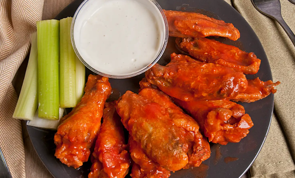 Order Pudgie’s Signature Hot Wings food online from Nathan Famous store, Selden on bringmethat.com