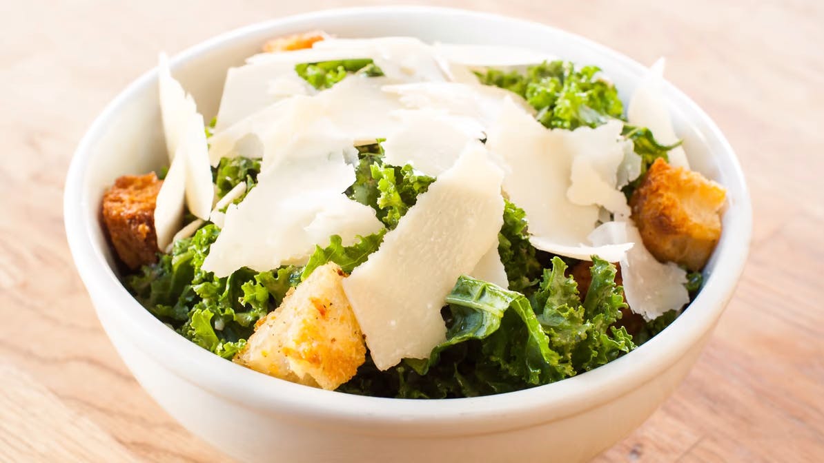 Order Insalata Kale Caesar - Salad food online from Broccolino Pizza store, Brooklyn on bringmethat.com