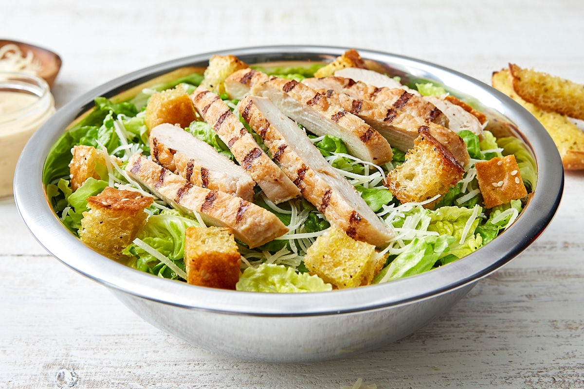 Order Chicken Caesar Salad food online from Schlotzskys Deli store, Humble on bringmethat.com