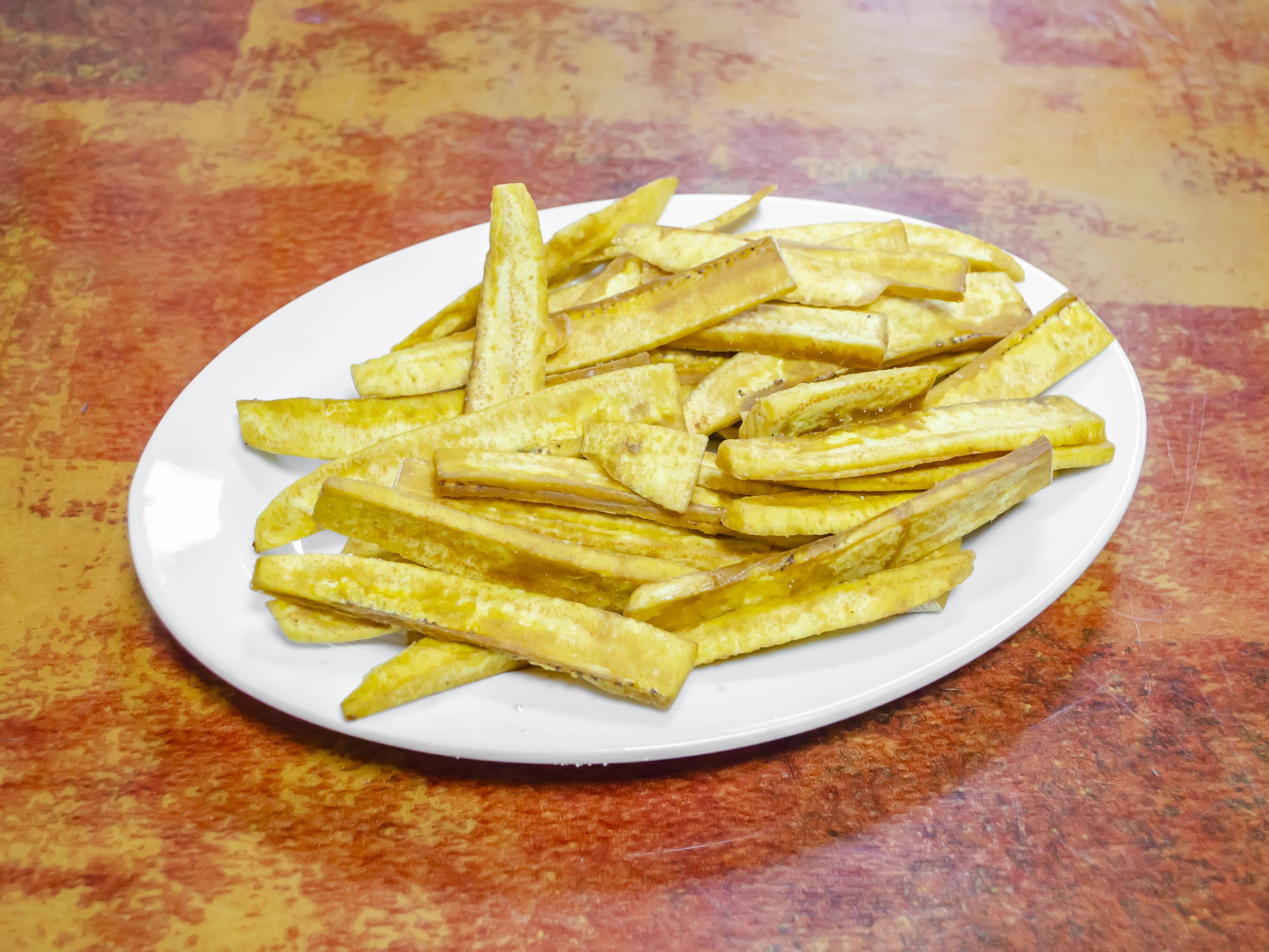 Order Fried Plantain food online from Coconut Palm Bar & Grill store, Bronx on bringmethat.com