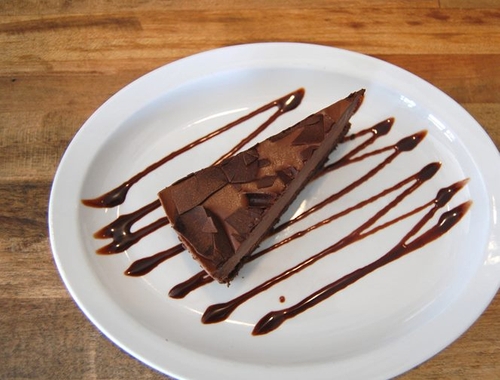 Order Chocolate Cake food online from Rosti Tuscan Kitchen store, Santa Monica on bringmethat.com