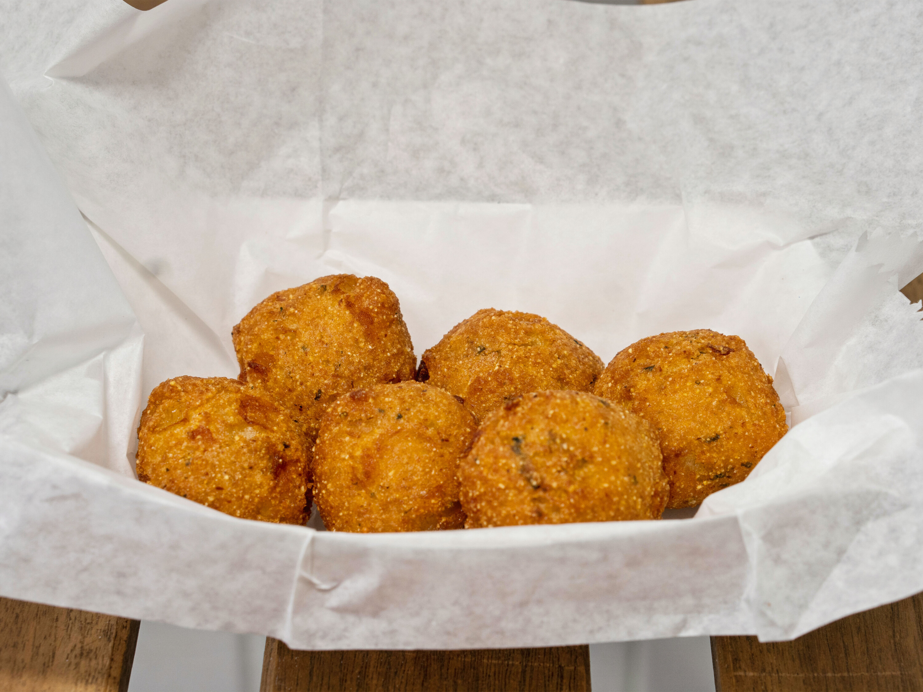 Order Hush Puppies food online from Luna's Chicken N Seafood store, Kansas City on bringmethat.com