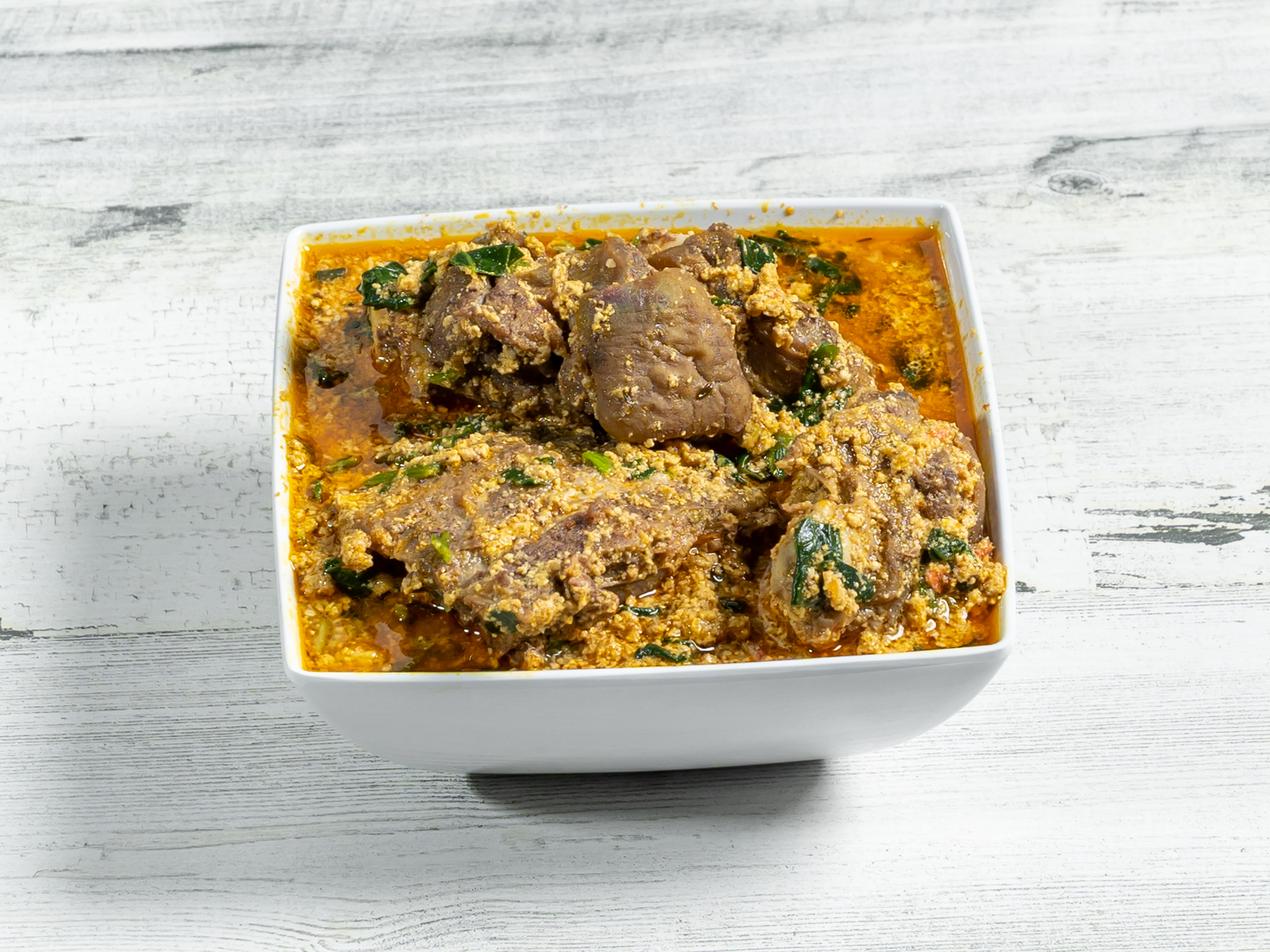 Order Any Soup with Goat Meat: Egusi/Okro/Vegetable/Onugbo/Ogbono food online from Aso Rock African Restaurant store, Dallas on bringmethat.com
