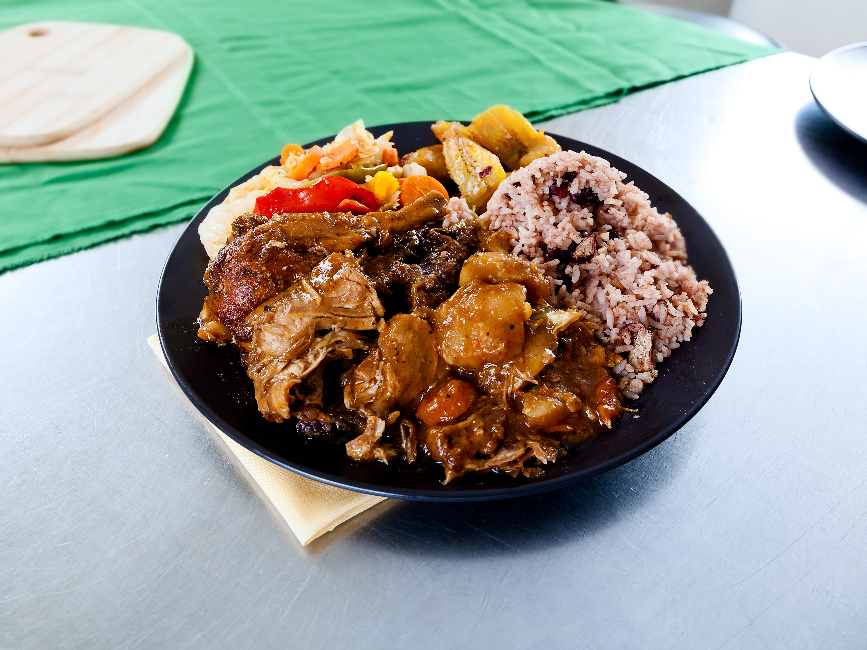 Order Curry Goat Plate food online from Barrington Jamaican Kitchen store, Bakersfield on bringmethat.com