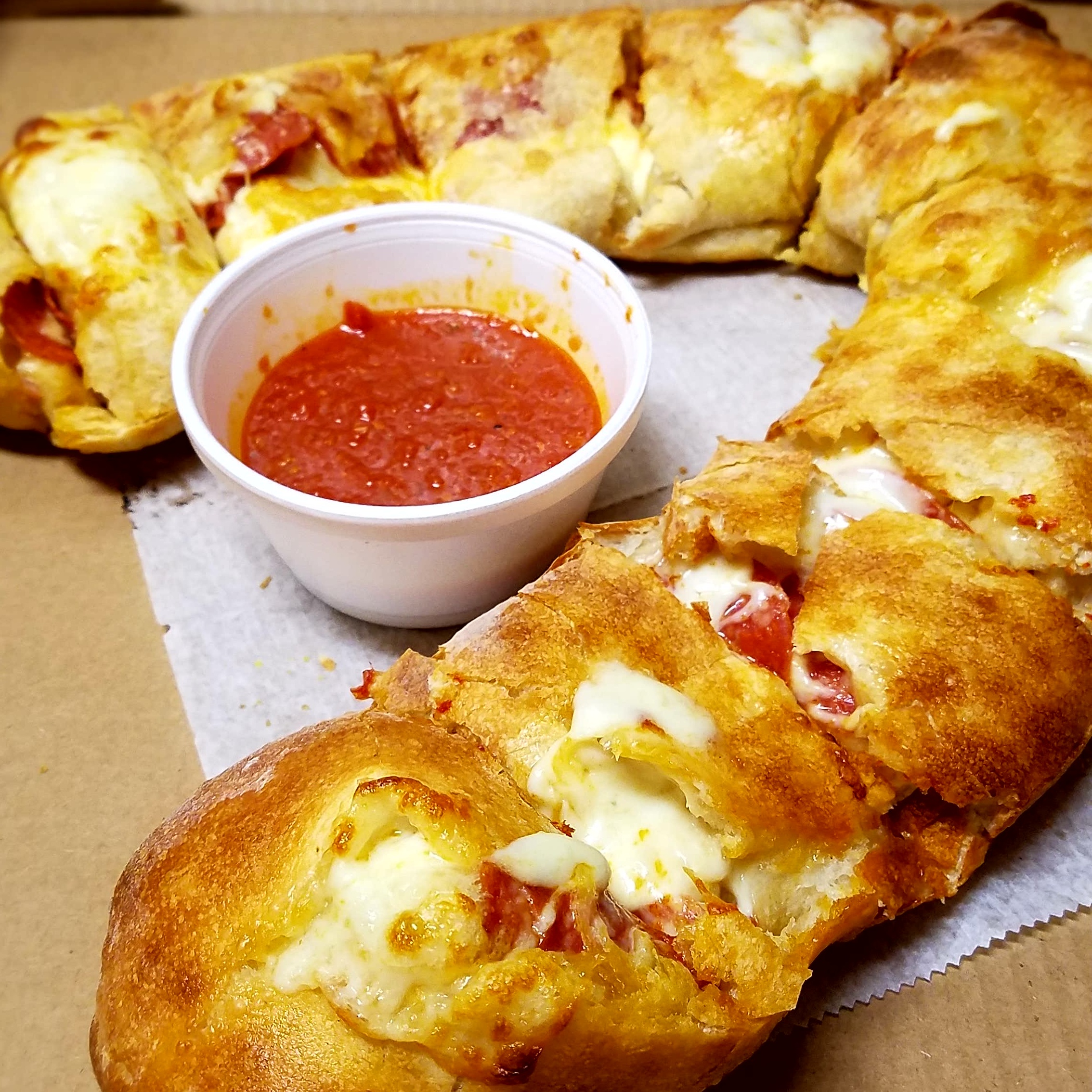 Order Calzone food online from Nino's Pizza store, Boston on bringmethat.com