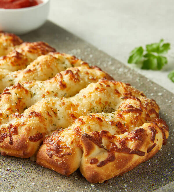 Order Asiago Cheese Bread (Full) food online from Donatos store, Highland Heights on bringmethat.com