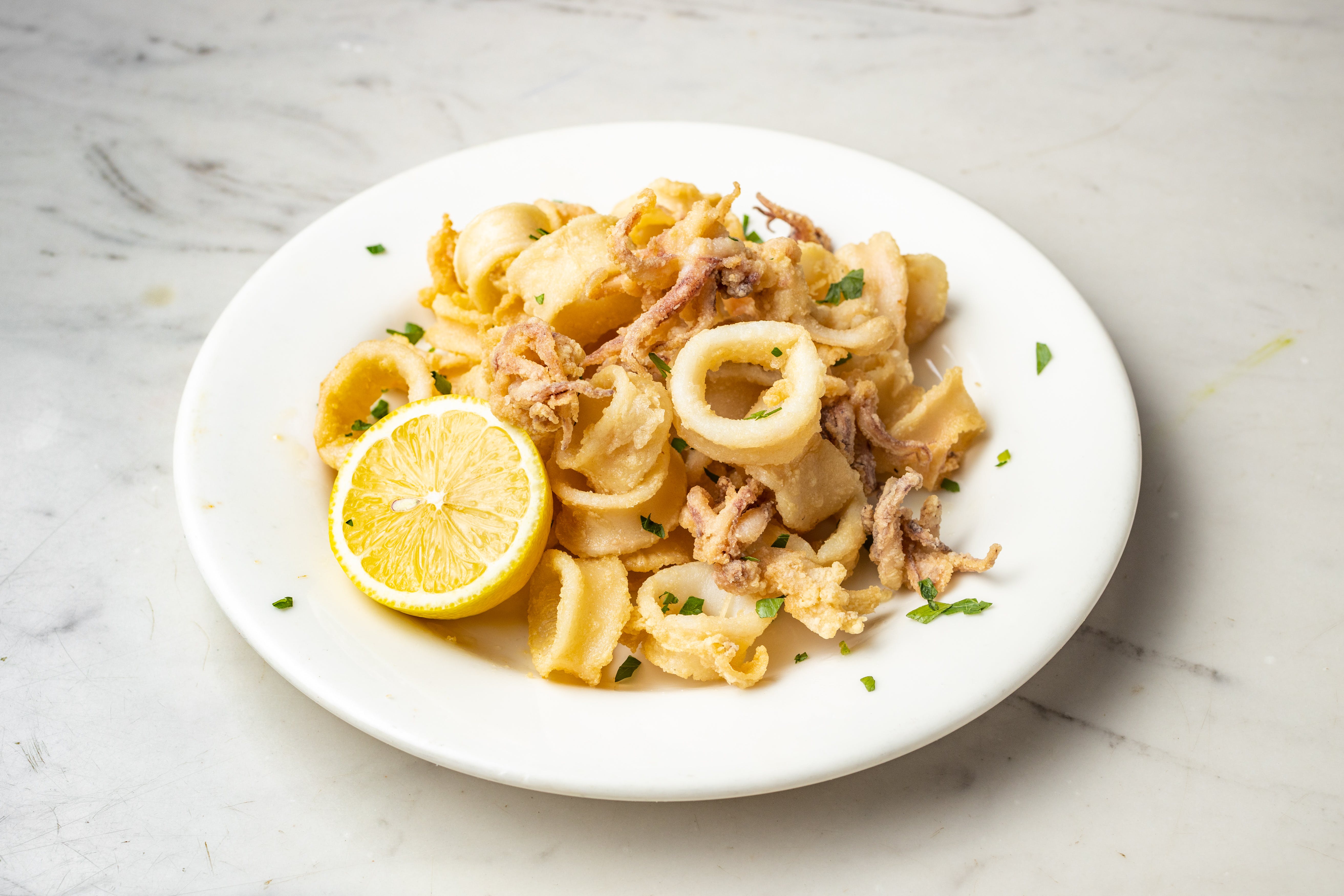 Order Fried Calamari - Appetizers food online from Graziella Pizza store, Flushing on bringmethat.com