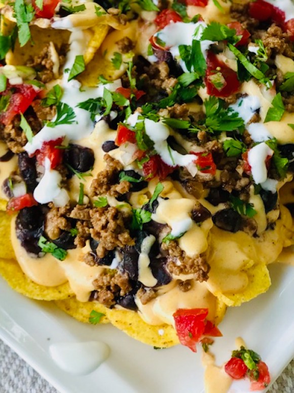 Order Loaded Beef Nachos food online from Yellowstone Coffee And Canvas store, Billings on bringmethat.com