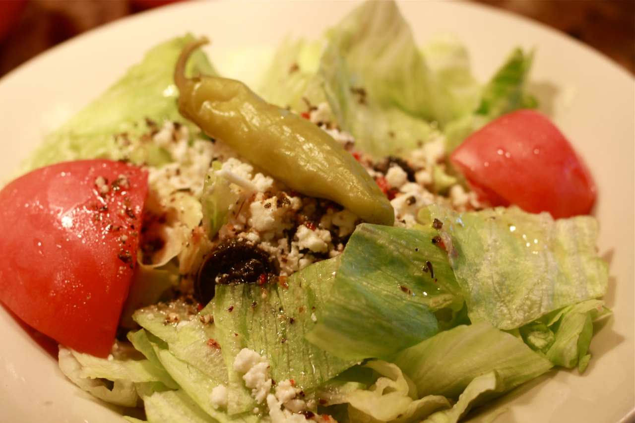 Order Greek Salad food online from Romes Pizza store, Helotes on bringmethat.com