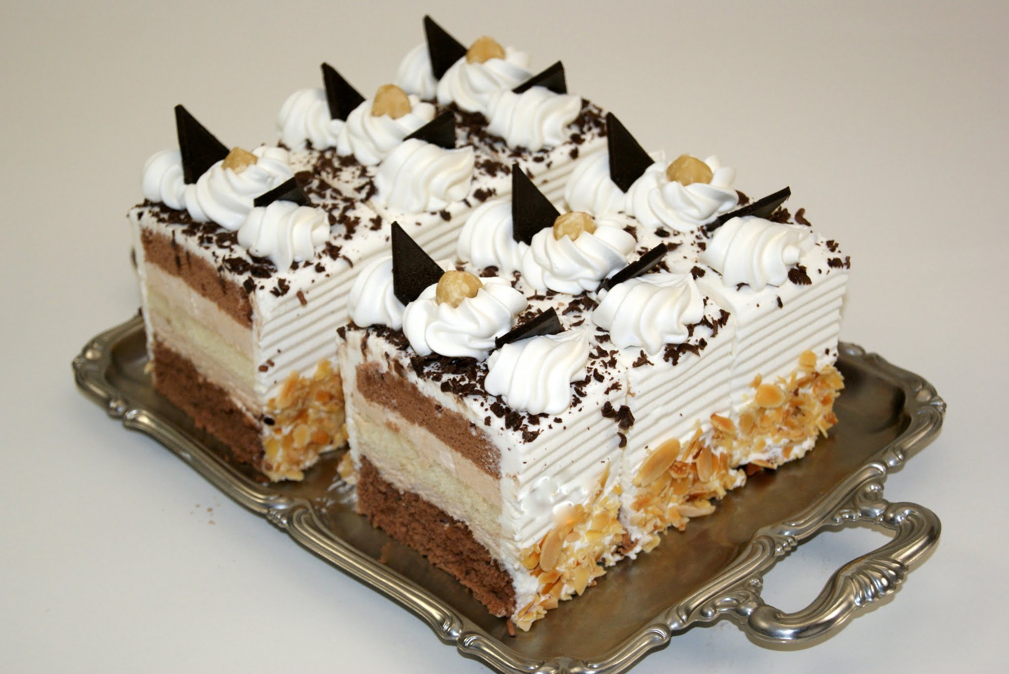 Order Hazelnut Whipped Cream Torte food online from Lutz Cafe & Pastry Shop store, CHICAGO on bringmethat.com