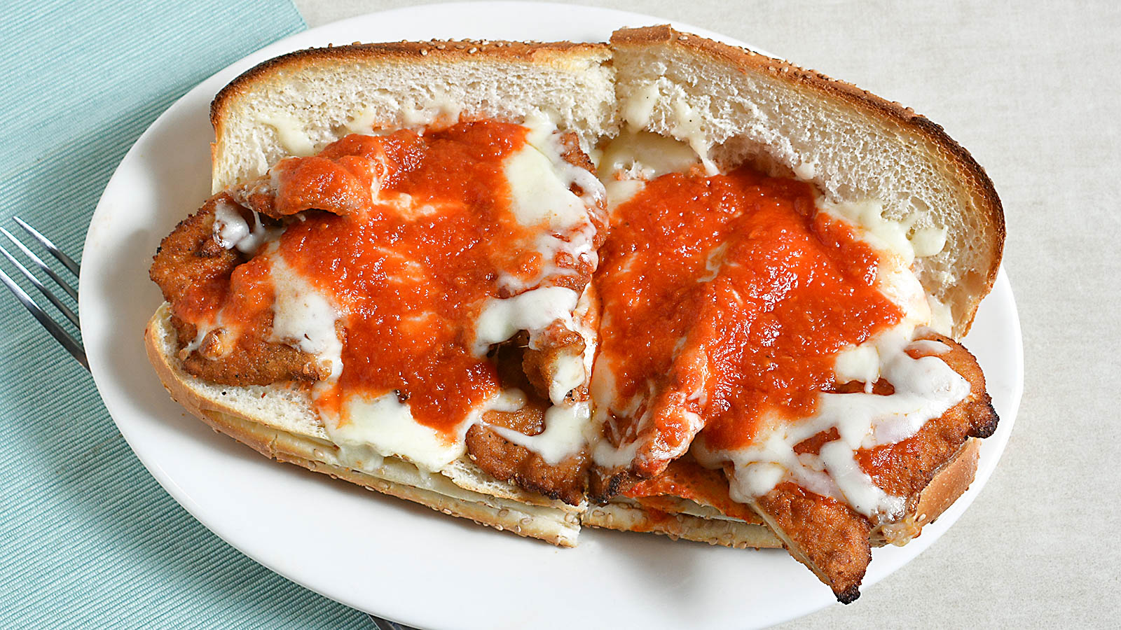 Order Chicken Parmigiana Hero food online from Mario's Pizzeria store, Oyster Bay on bringmethat.com