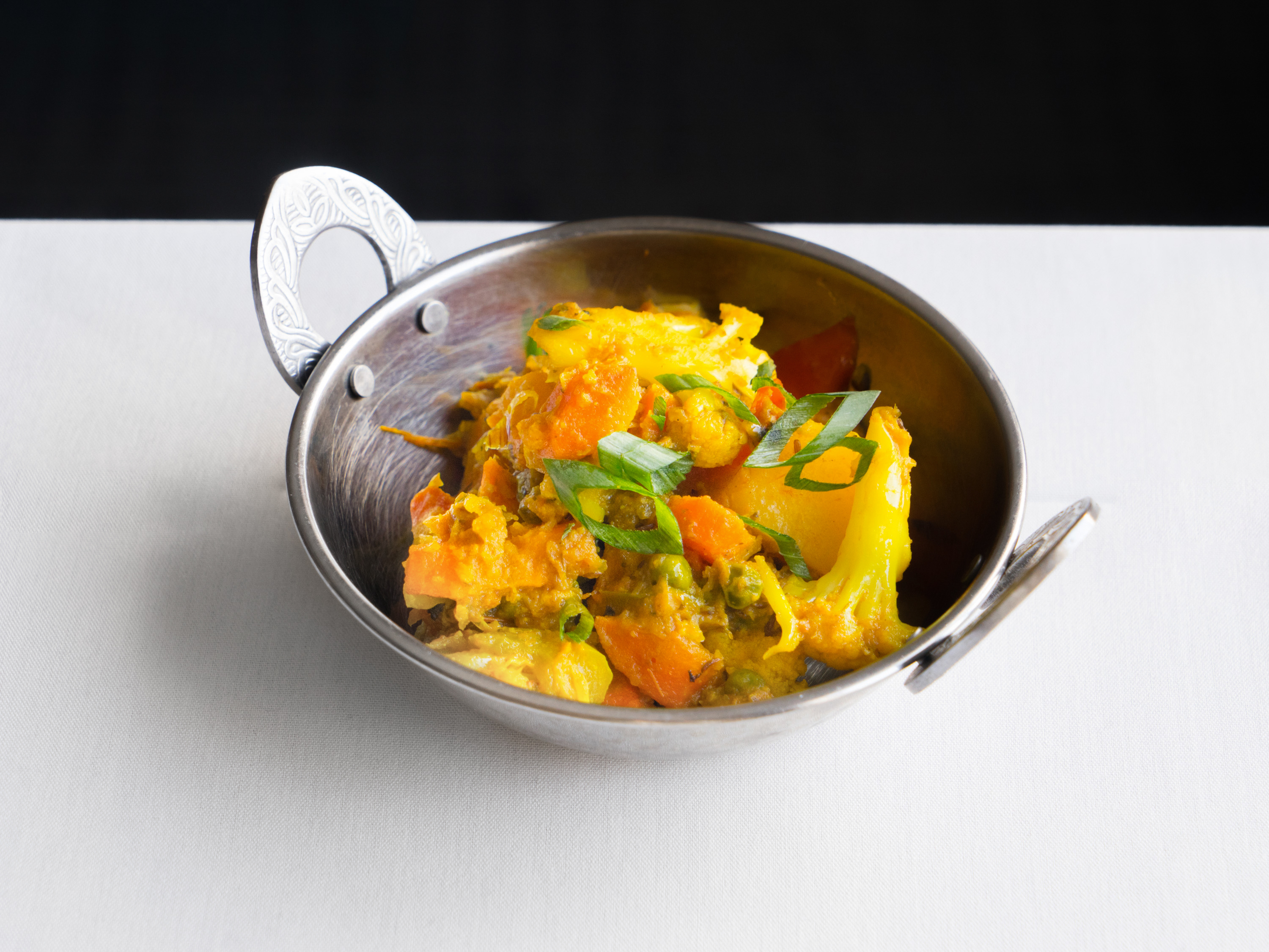 Order Mixed Vegetable Curry food online from India Palace store, Burnsville on bringmethat.com