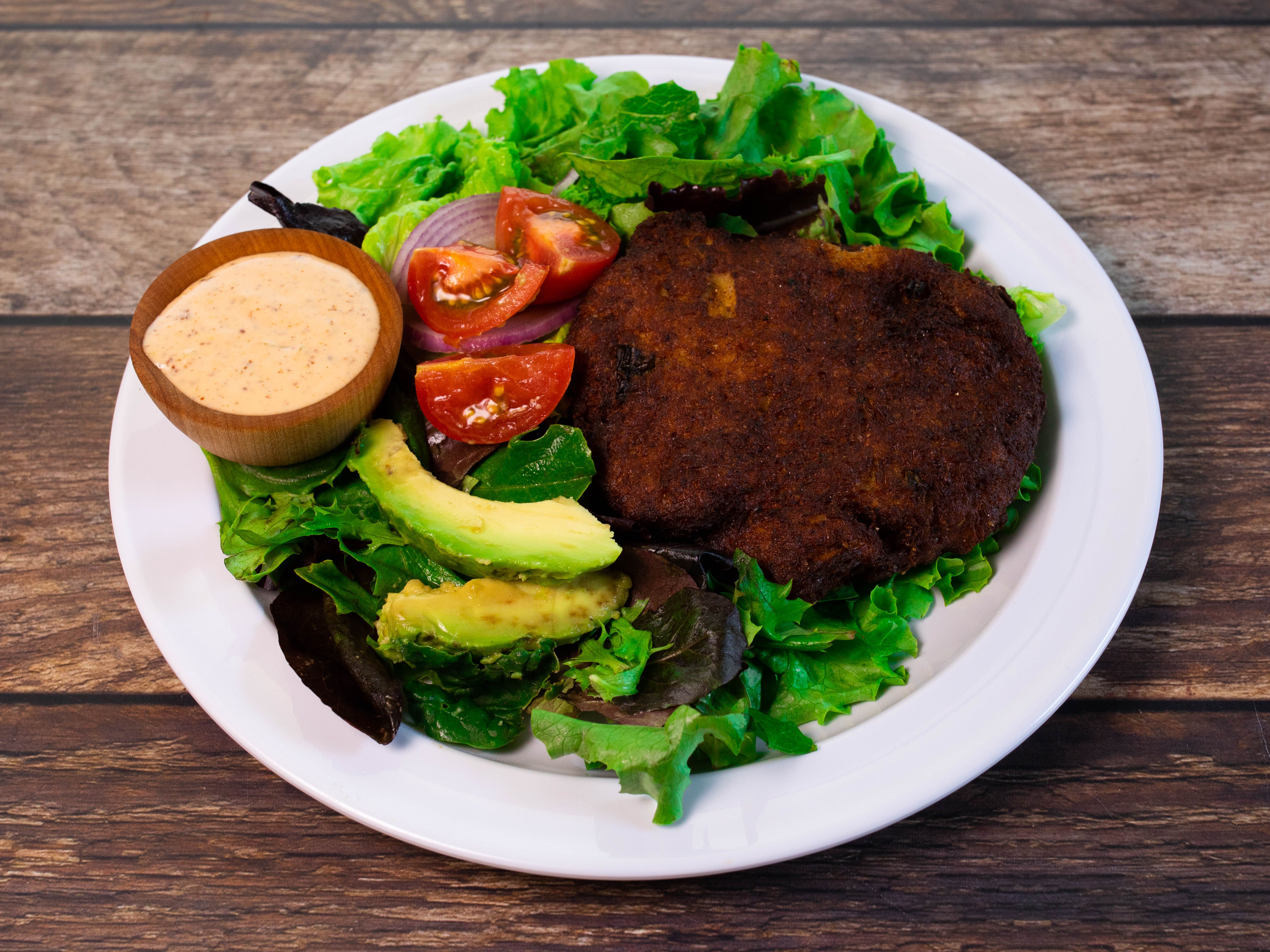 Order Crab Cake on Spring Mix food online from Fairfield Market & Cafe store, Shreveport on bringmethat.com