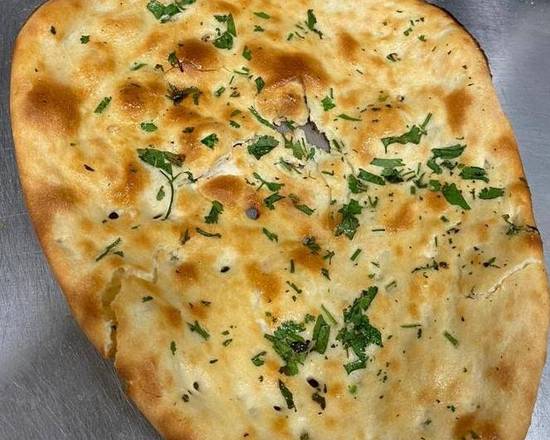 Order Cilantro Naan food online from Flavours Of India store, Gresham on bringmethat.com