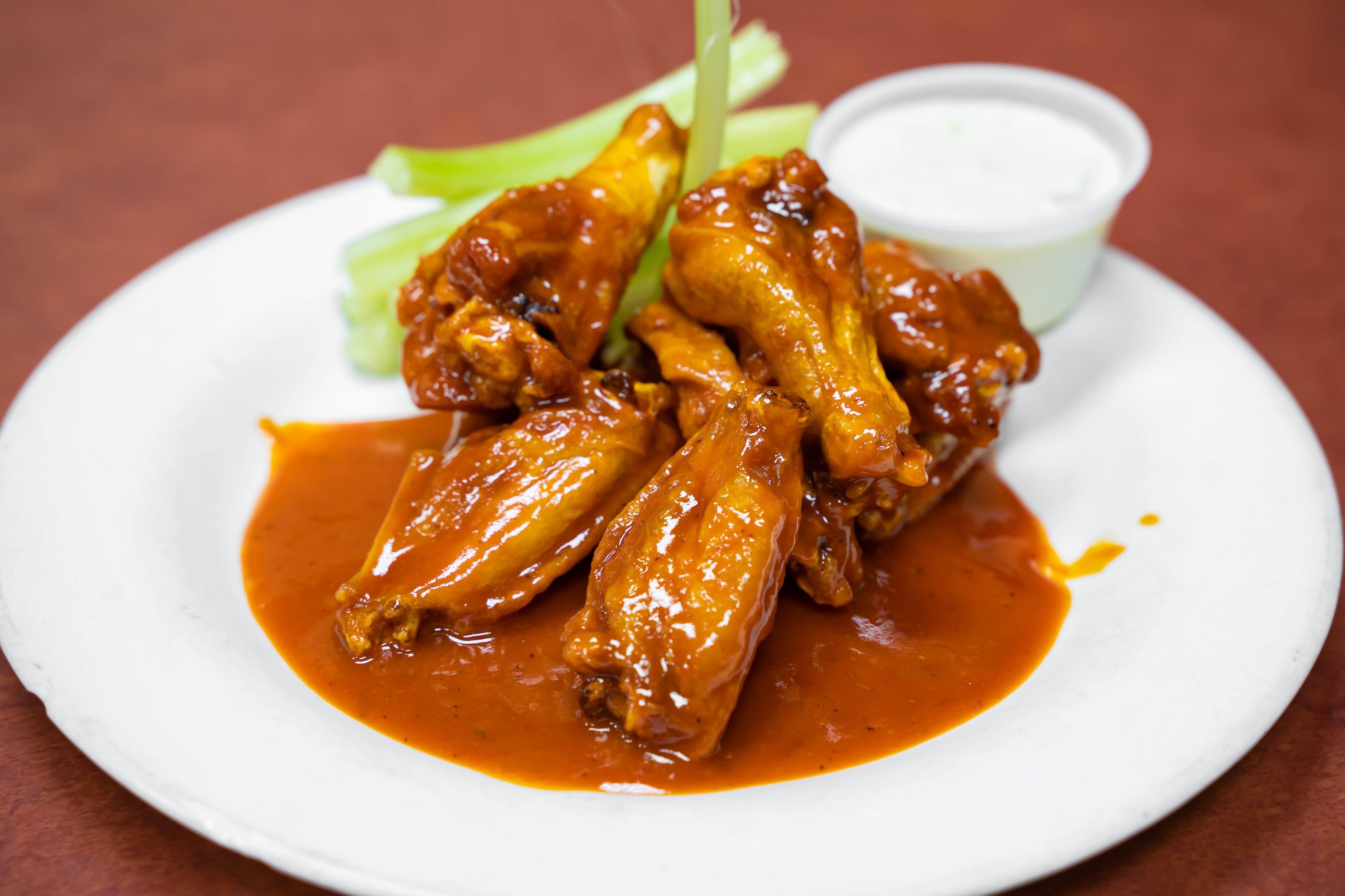 Order Buffalo Wings - 10 Pieces food online from Tony Sopranos Pizza store, Cherry Hill on bringmethat.com
