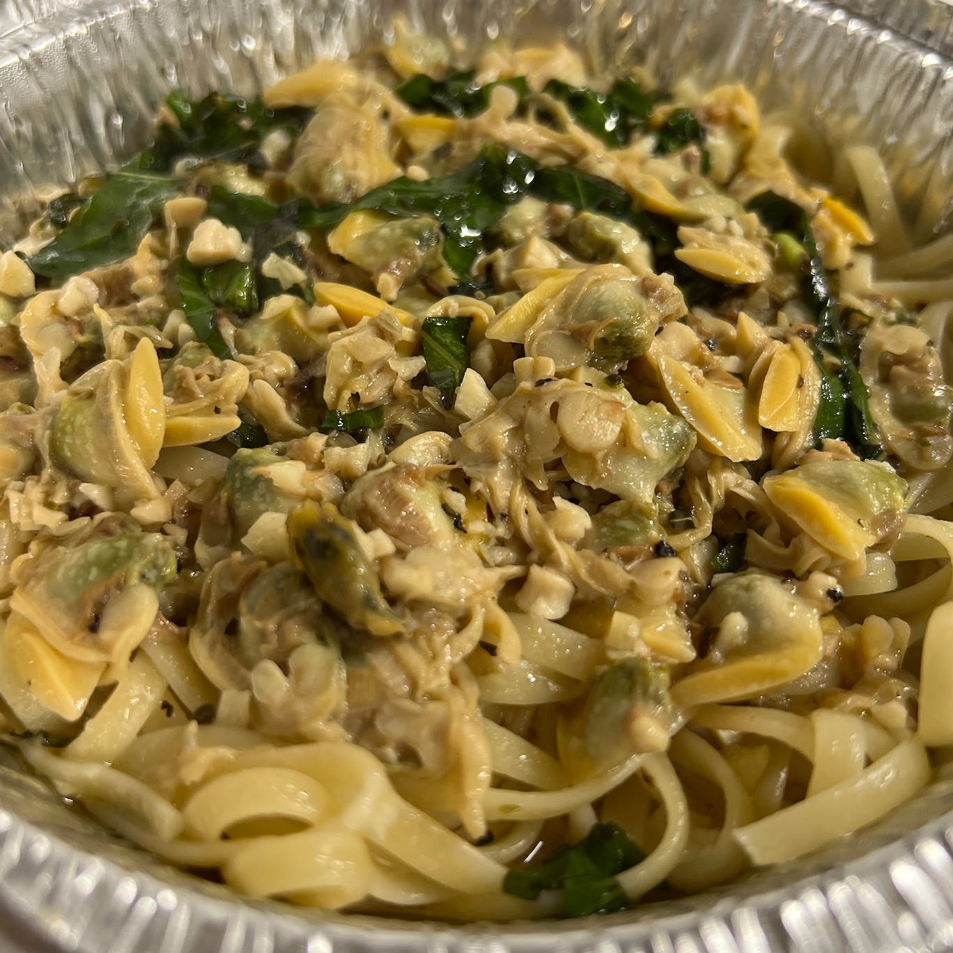 Order Linguine with White Clam Sauce - Pasta food online from Napoli Pizza & Pasta store, Houston on bringmethat.com
