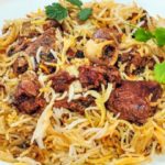 Order 66. Goat Biryani food online from Taj Restaurant store, Warren on bringmethat.com