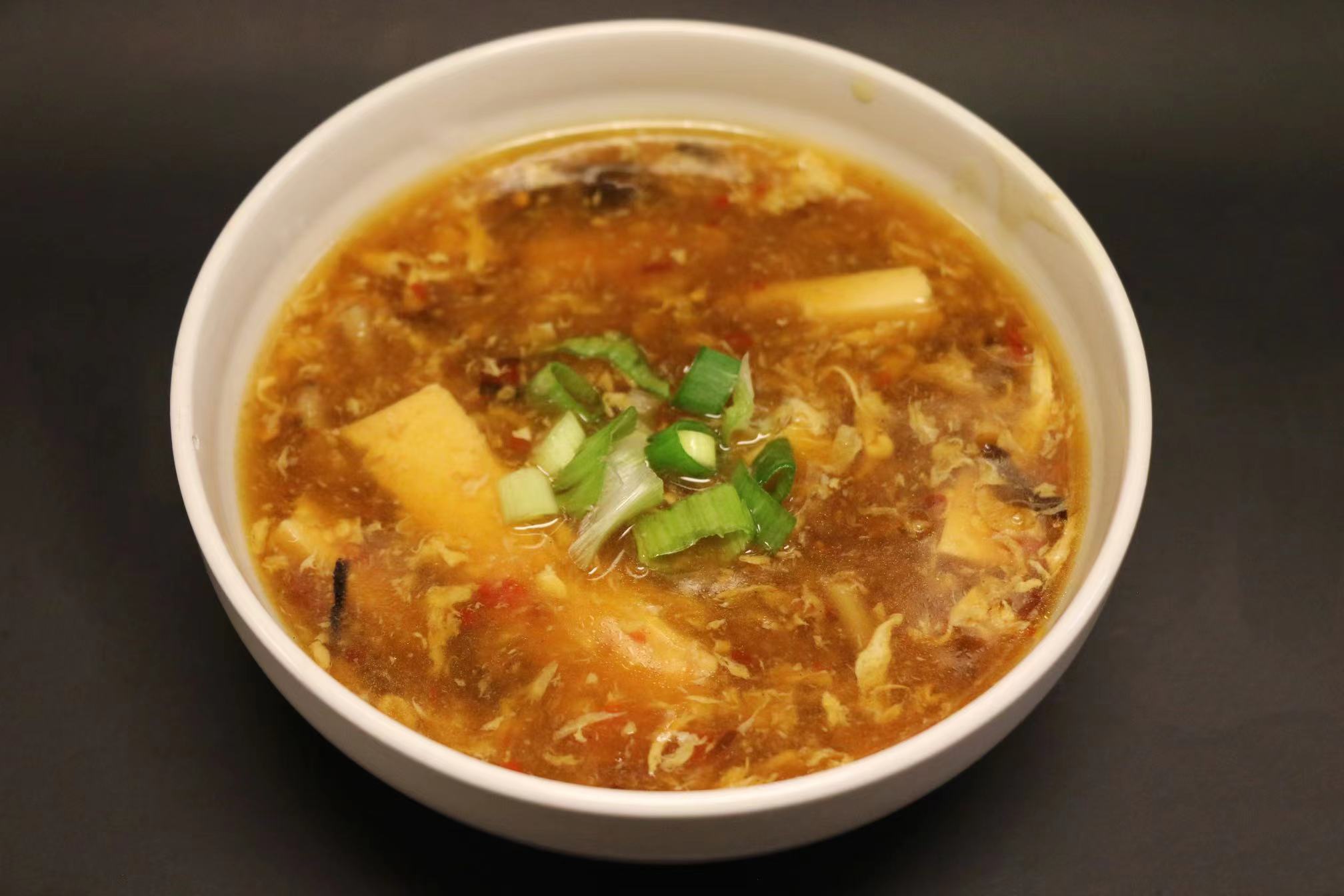 Order 14. Hot and Sour Soup 酸辣汤 food online from Yen Ching Chinese Restaurant store, Naperville on bringmethat.com