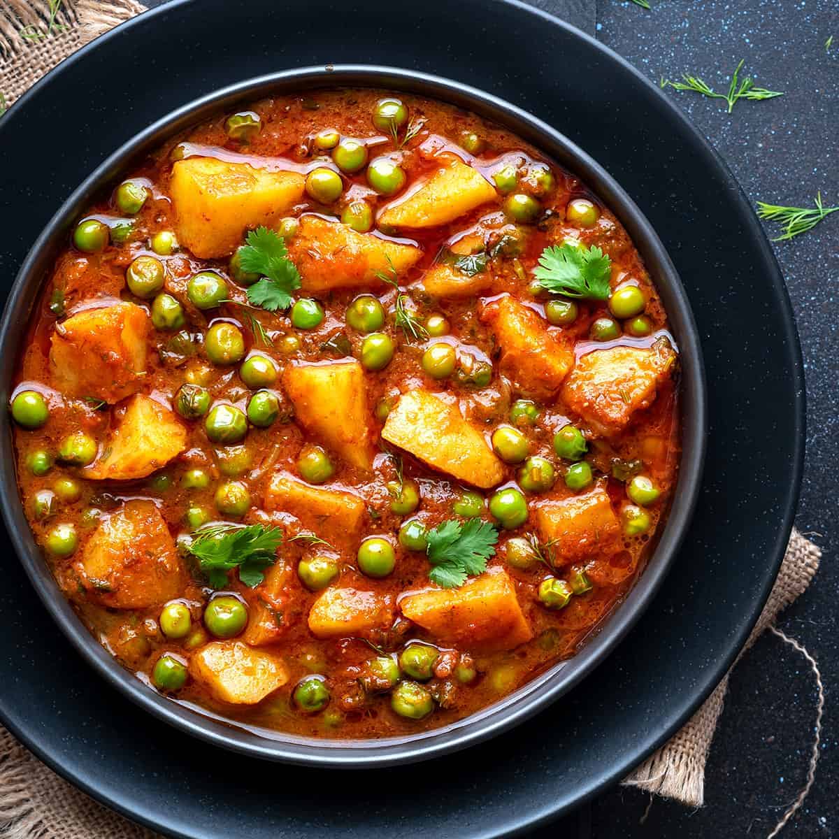 Order Aloo with Peas Curry food online from Desi Chops store, San Diego on bringmethat.com
