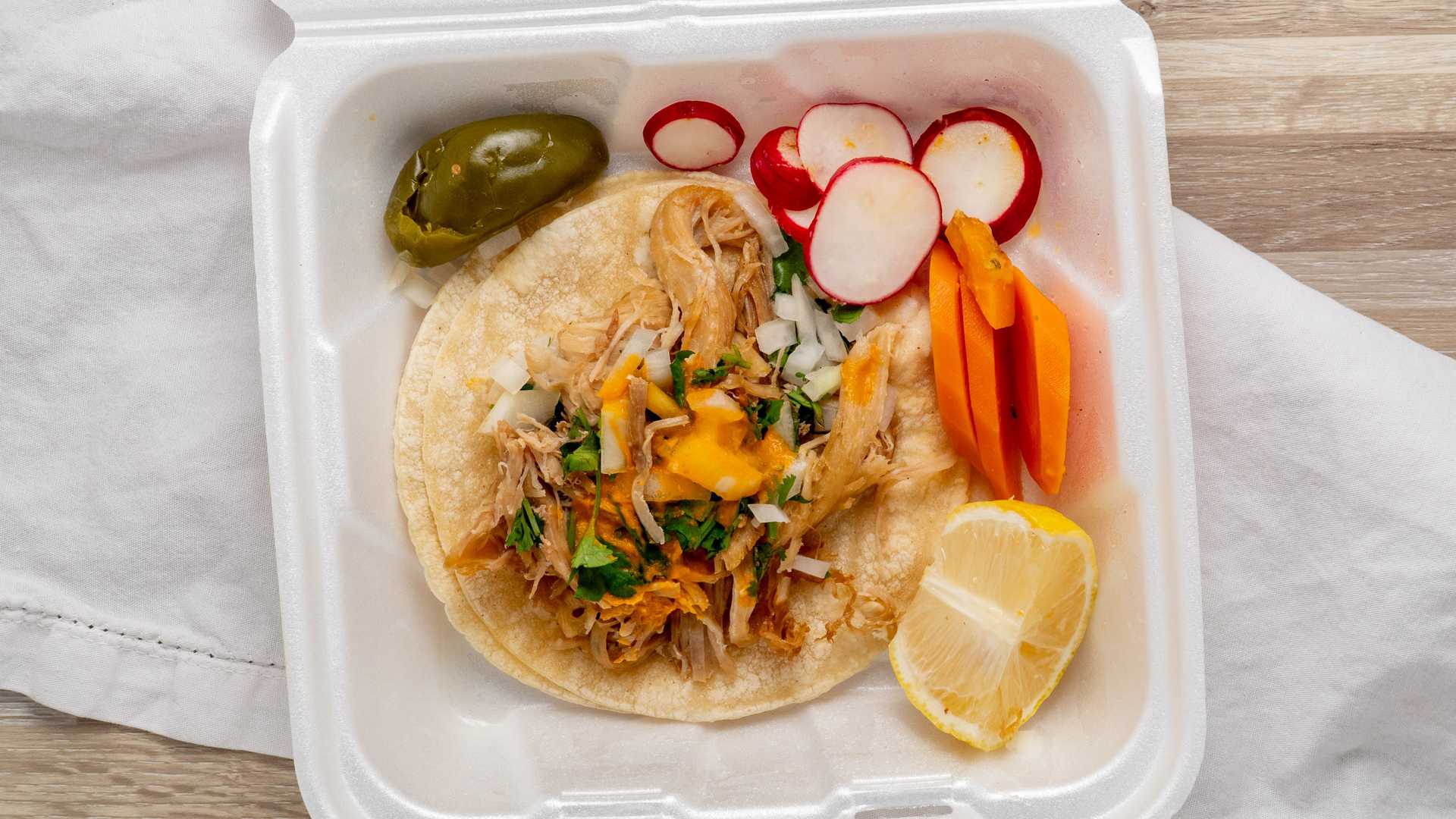 Order Carnitas Taco food online from El Puerto Escondido store, San Bernardino on bringmethat.com