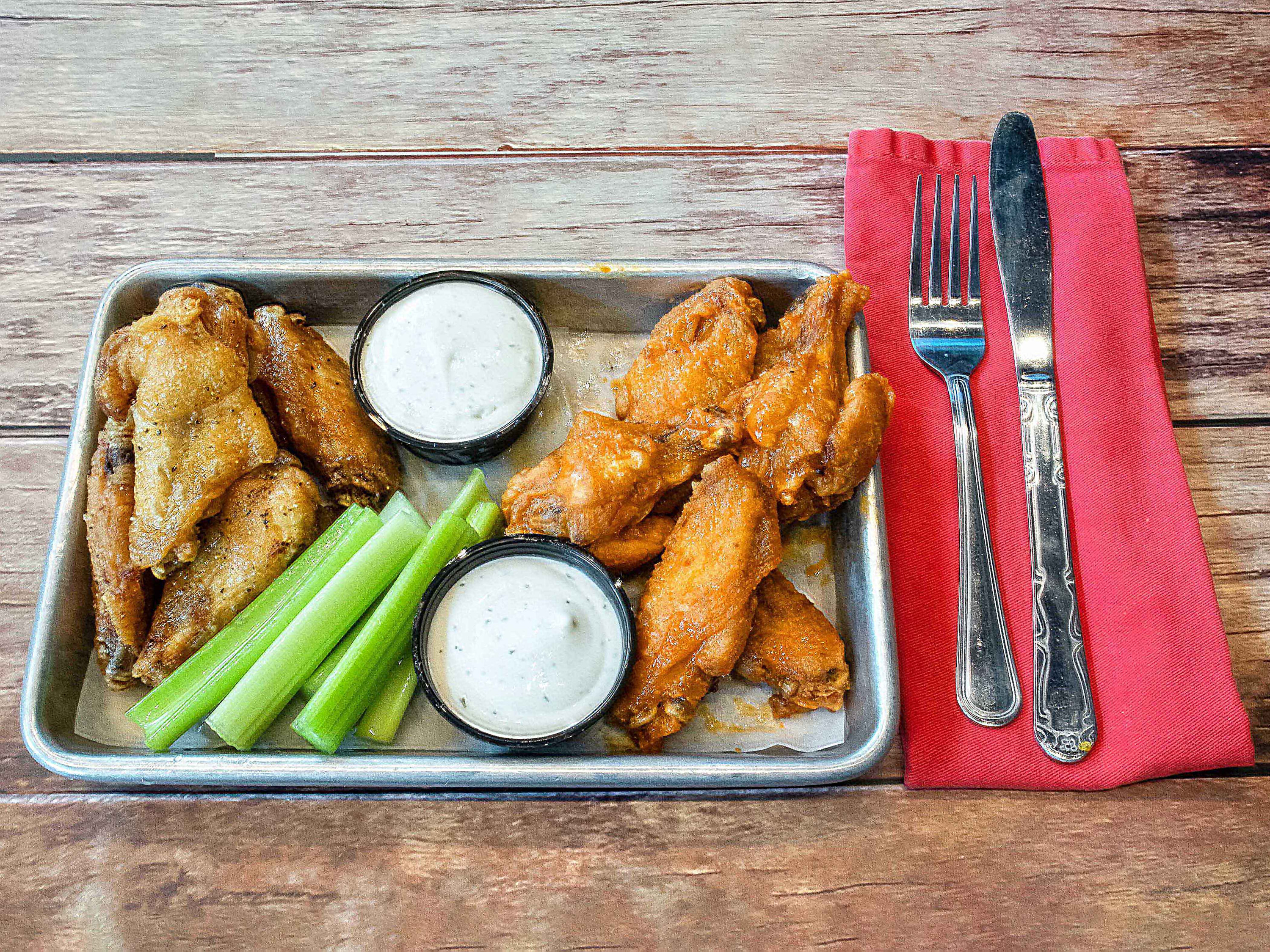 Order 12 Count Classic Bone in Wings  food online from The Greyhound Bar & Grill store, Glendale on bringmethat.com