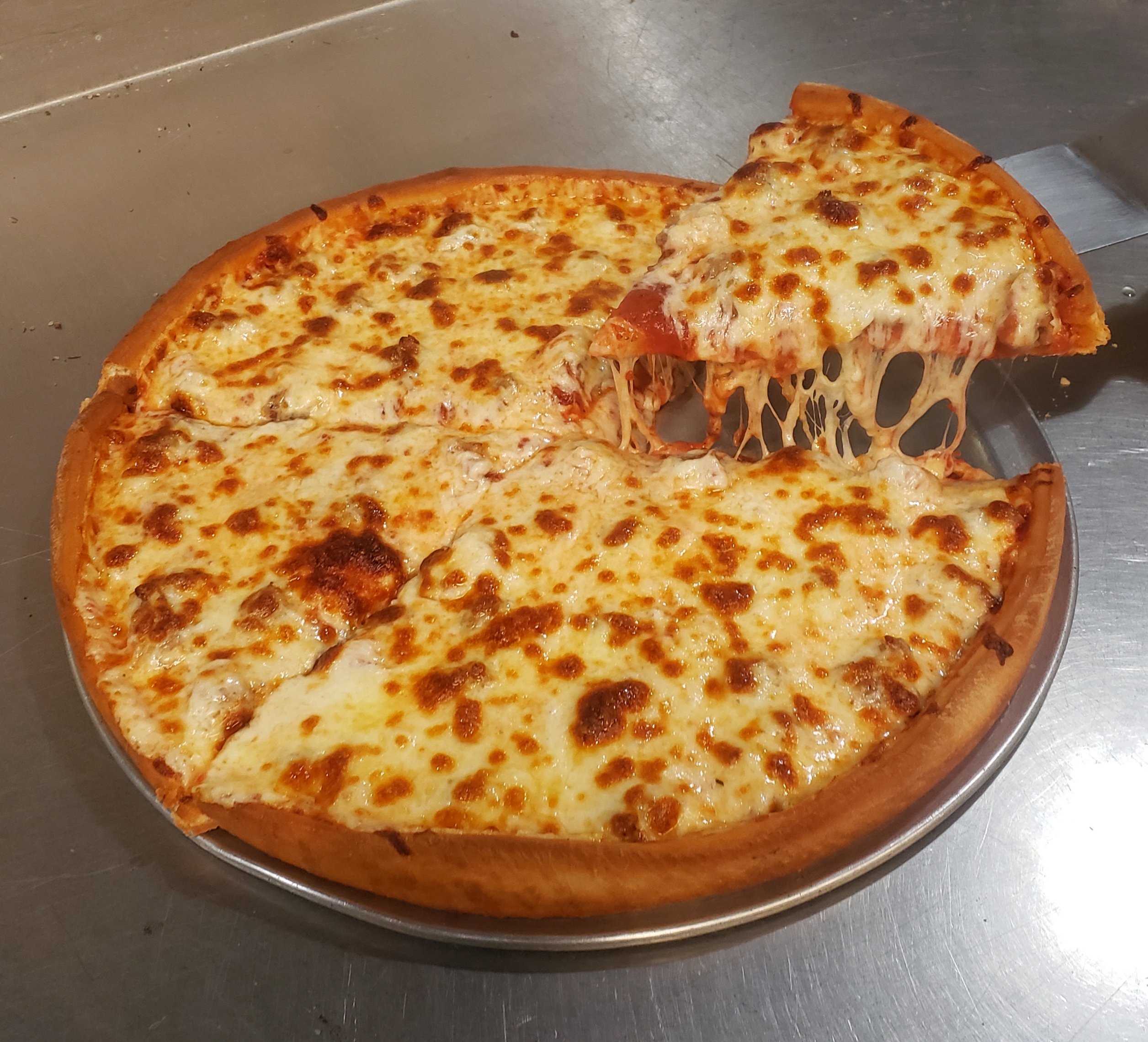 Order Pan Cheese Pizza food online from Village Pizza store, Chicago on bringmethat.com