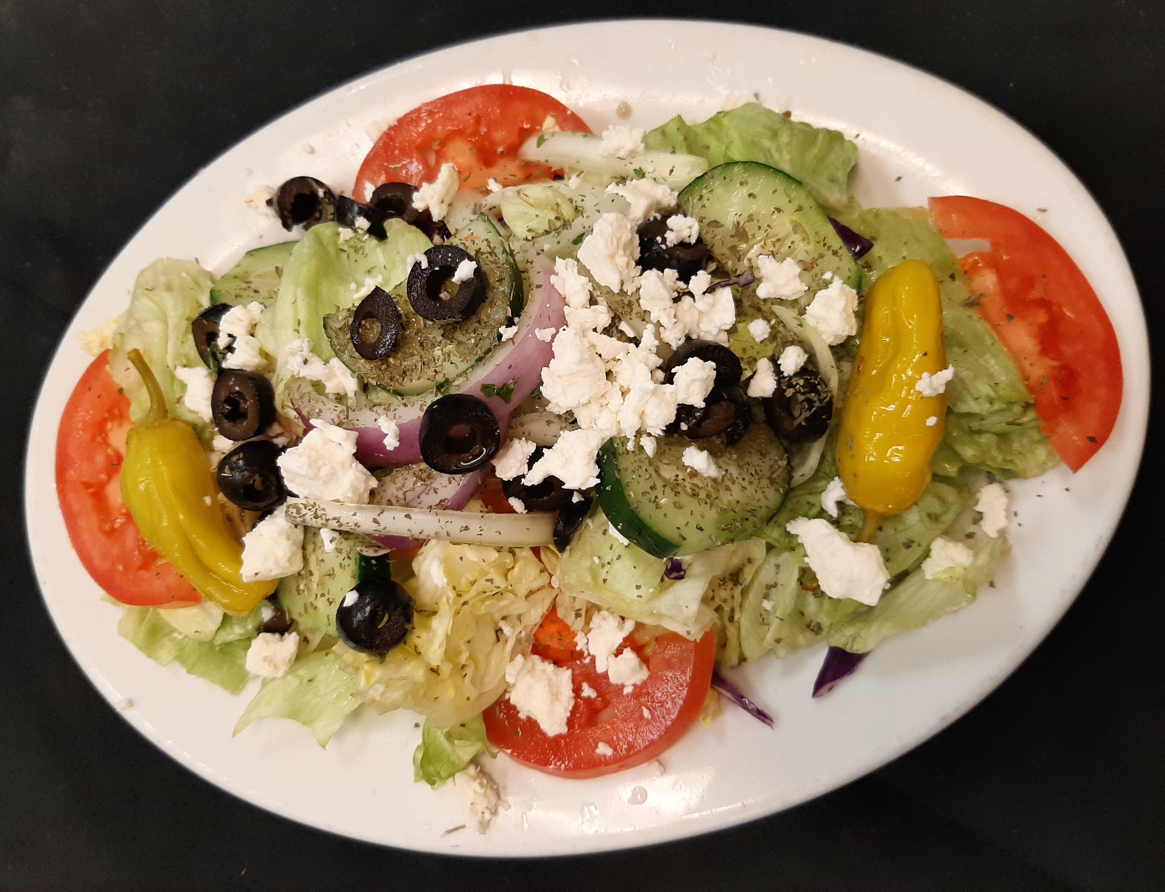 Order Greek Salad food online from Flame Kabob store, Raleigh on bringmethat.com