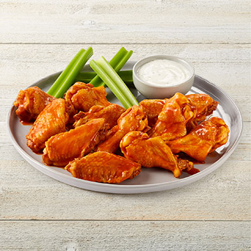 Order 12 Traditional Wings food online from Tgi Fridays store, Madison on bringmethat.com