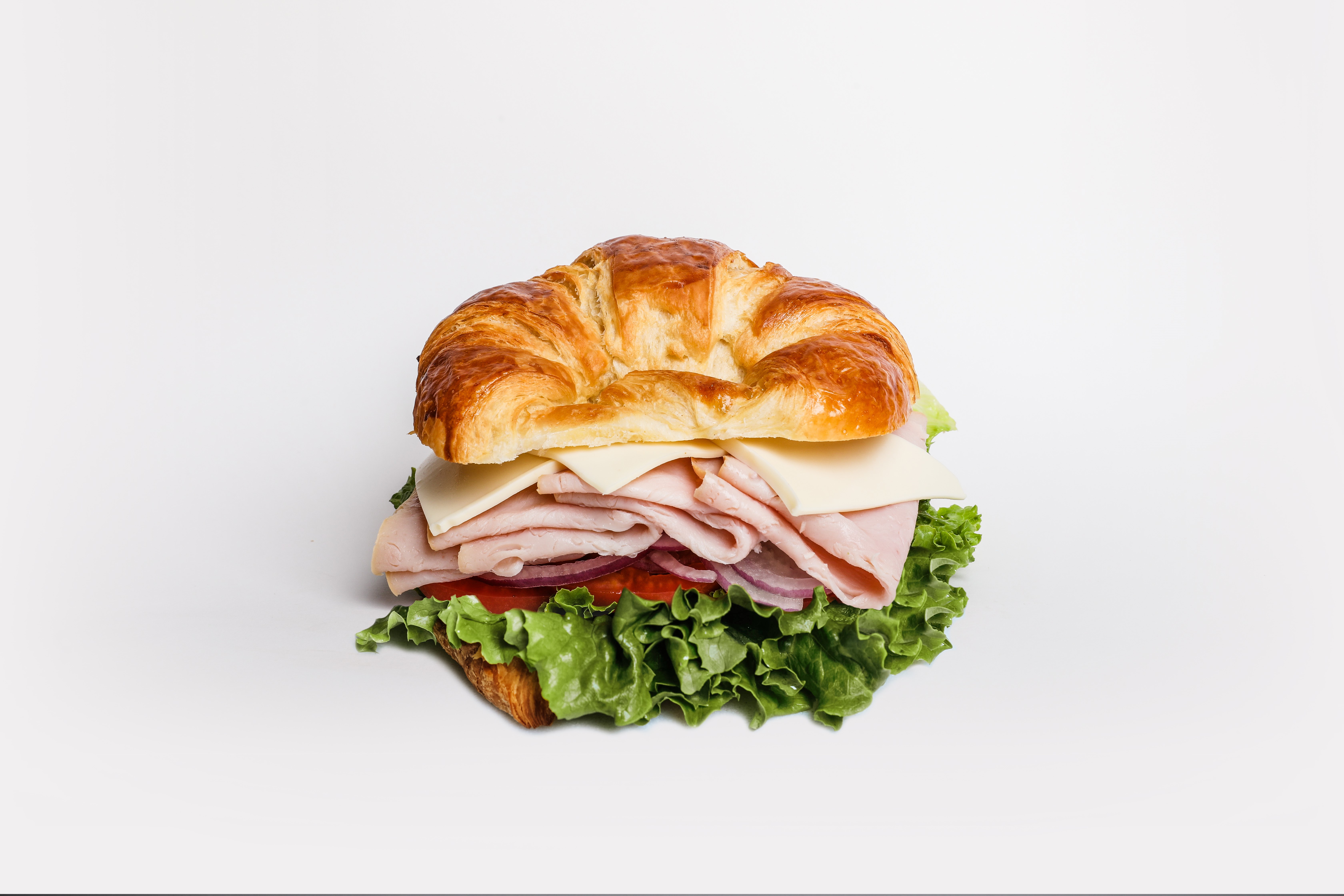 Order 20. Turkey Sandwich Croissant food online from Dc Cafe Donuts store, Reseda on bringmethat.com