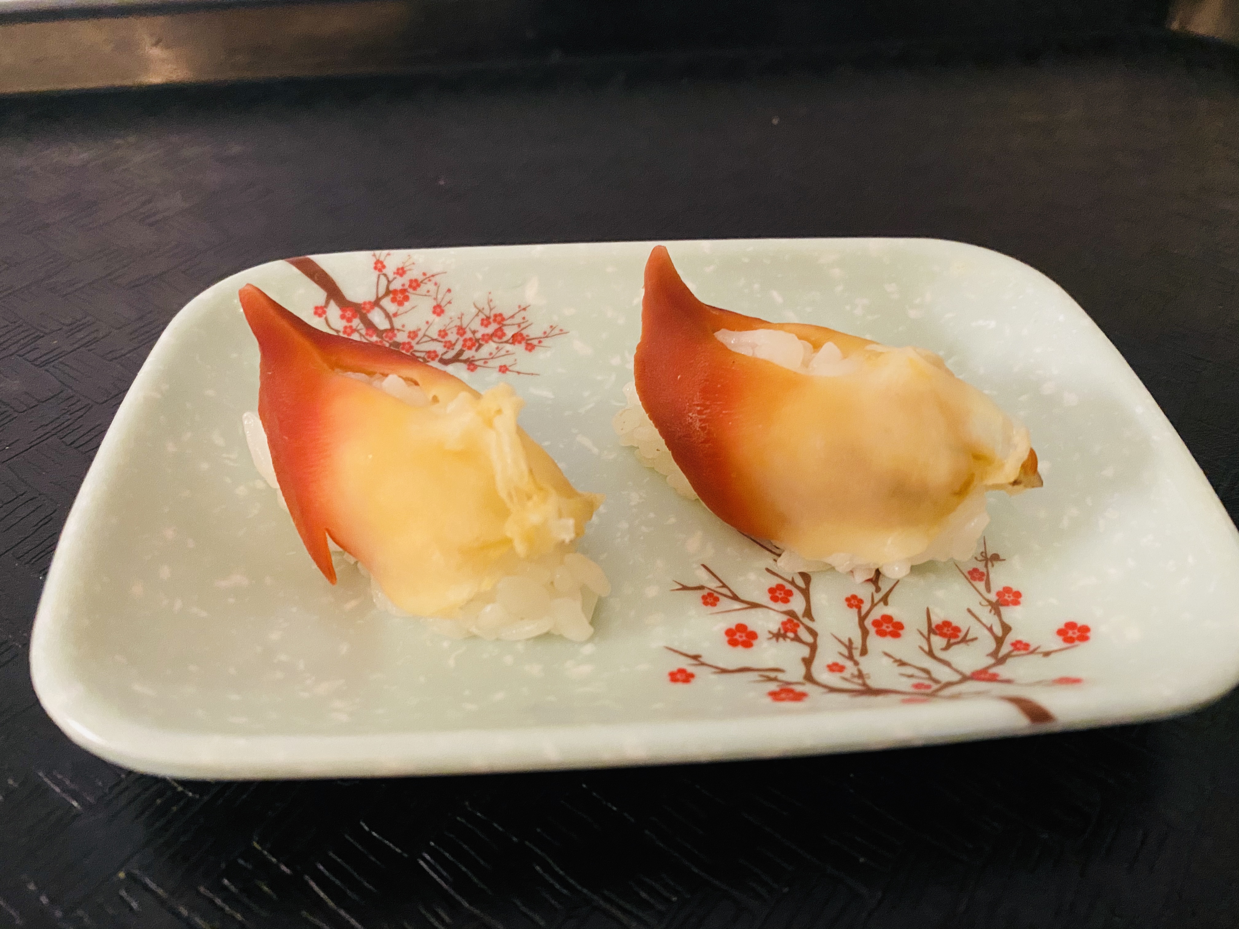 Order 49. Hokkigai Nigiri food online from Tengu Sushi store, Newport on bringmethat.com