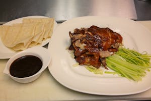 Order M26. 北京烤鸭 Peking Duck (Half) food online from Sichuan Hot Pot 九寨溝火锅川菜 store, Cleveland on bringmethat.com
