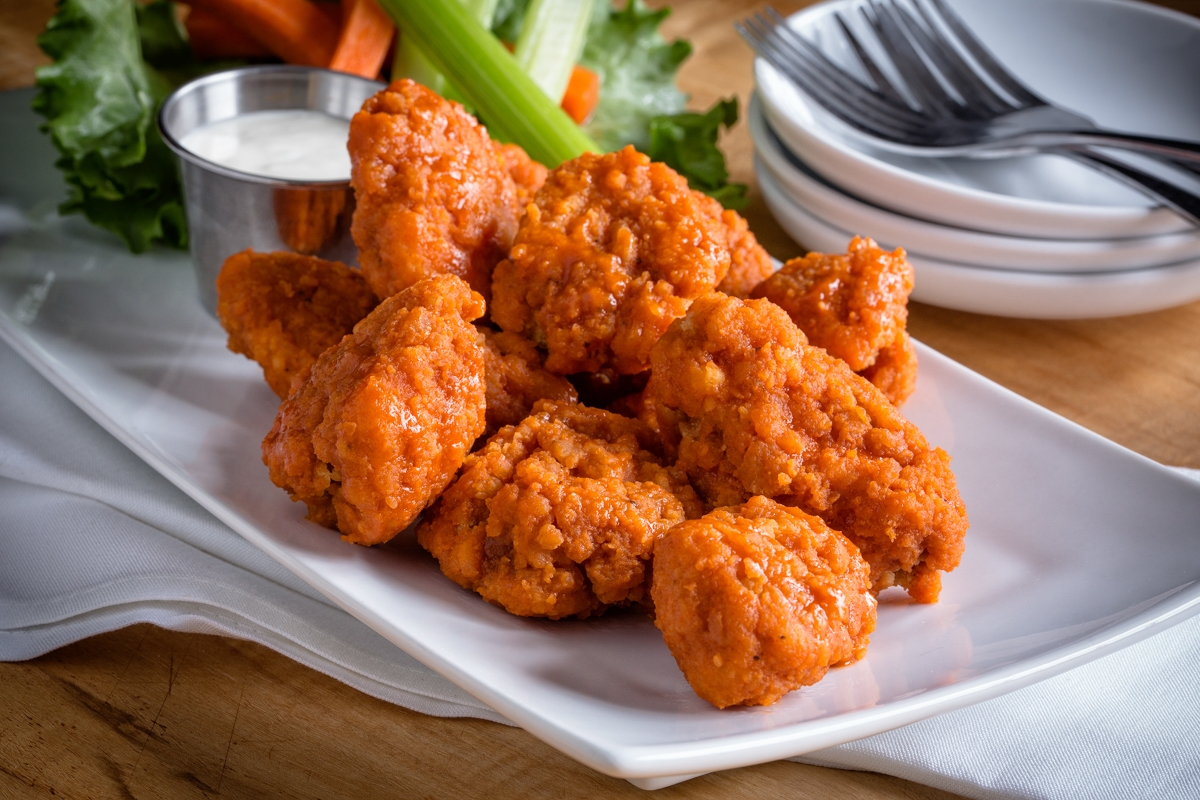 Order Boneless Chicken Bites food online from Uno Chicago Grill store, Maple Shade Township on bringmethat.com