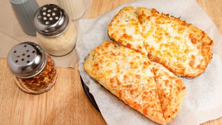 Order Garlic Bread Plain food online from Round Table Pizza store, San Jose on bringmethat.com