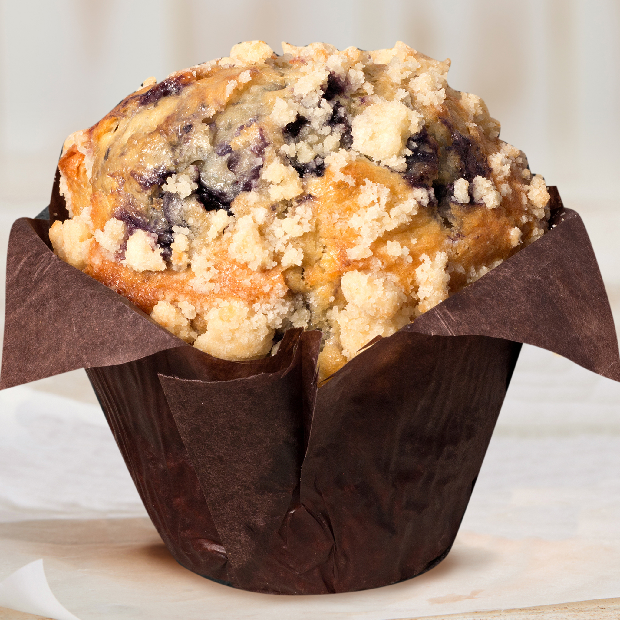 Order Blueberry Muffin food online from Bruegger's Bagels store, Durham on bringmethat.com