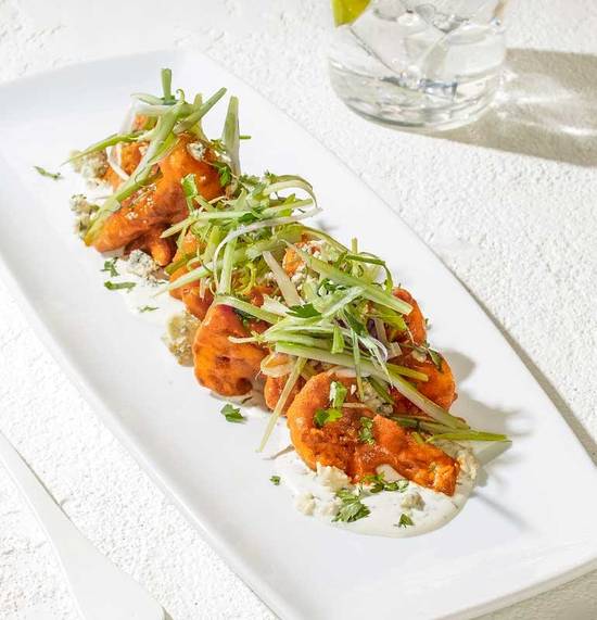Order SPICY BUFFALO CAULIFLOWER food online from California Pizza Kitchen store, Bakersfield on bringmethat.com