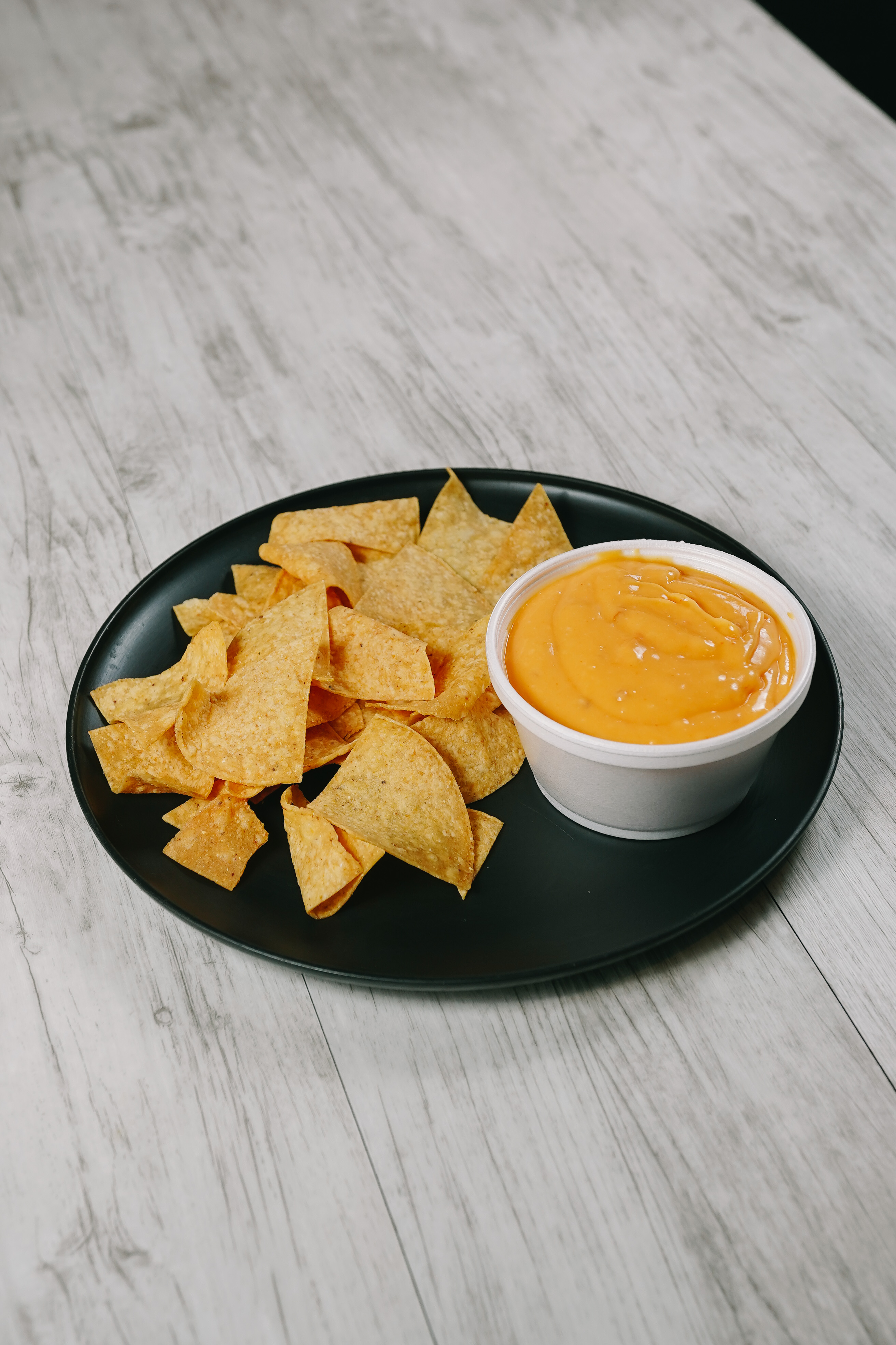 Order Chips and Nacho Cheese food online from Taqueria Los Gueros store, Totowa on bringmethat.com