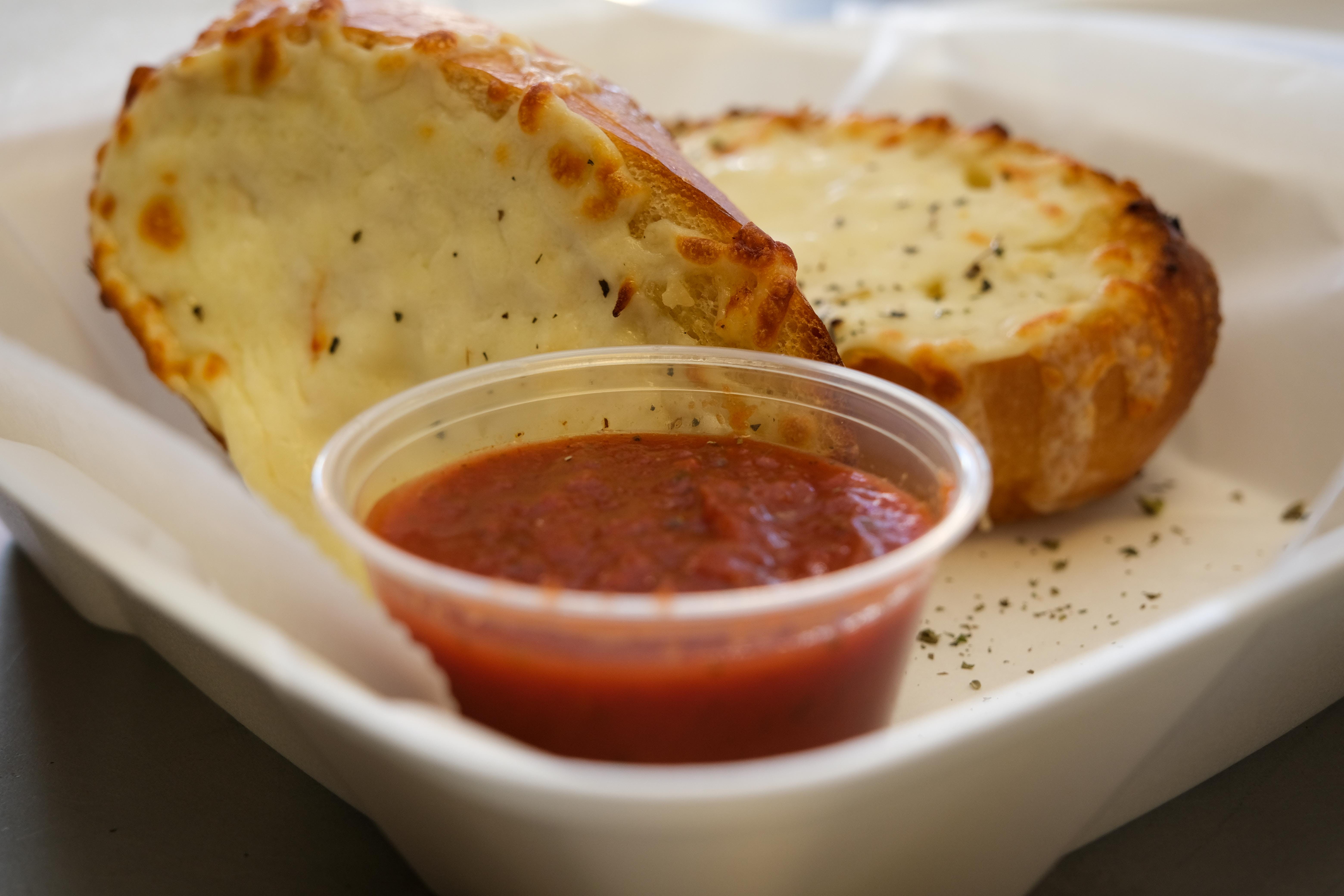 Order Garlic Cheese bread - Small (2 Pieces) food online from Uptown Pizza store, Minneapolis on bringmethat.com
