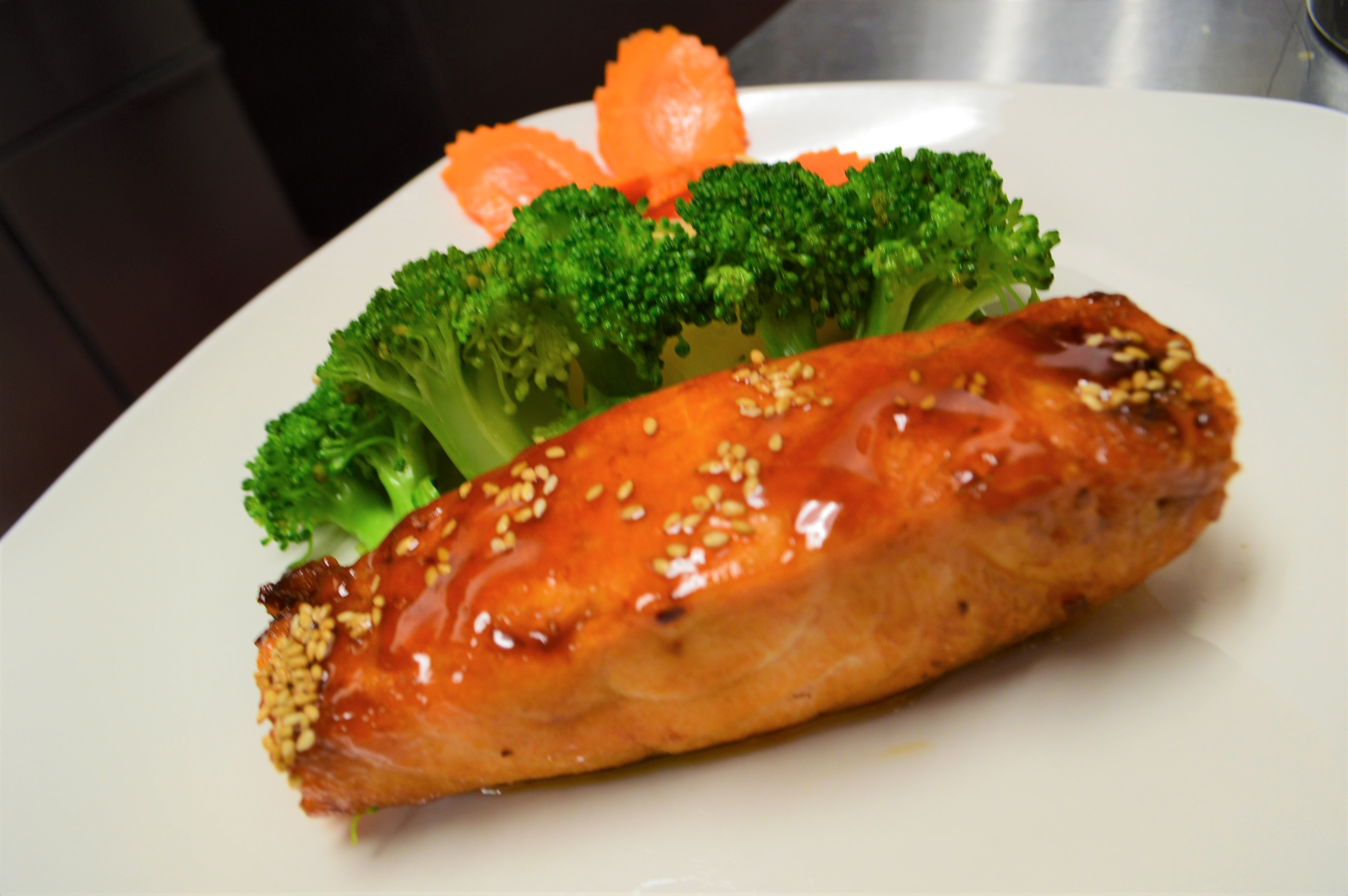 Order 47. Teriyaki Salmon food online from Rialto Thai Kitchen store, Rialto on bringmethat.com