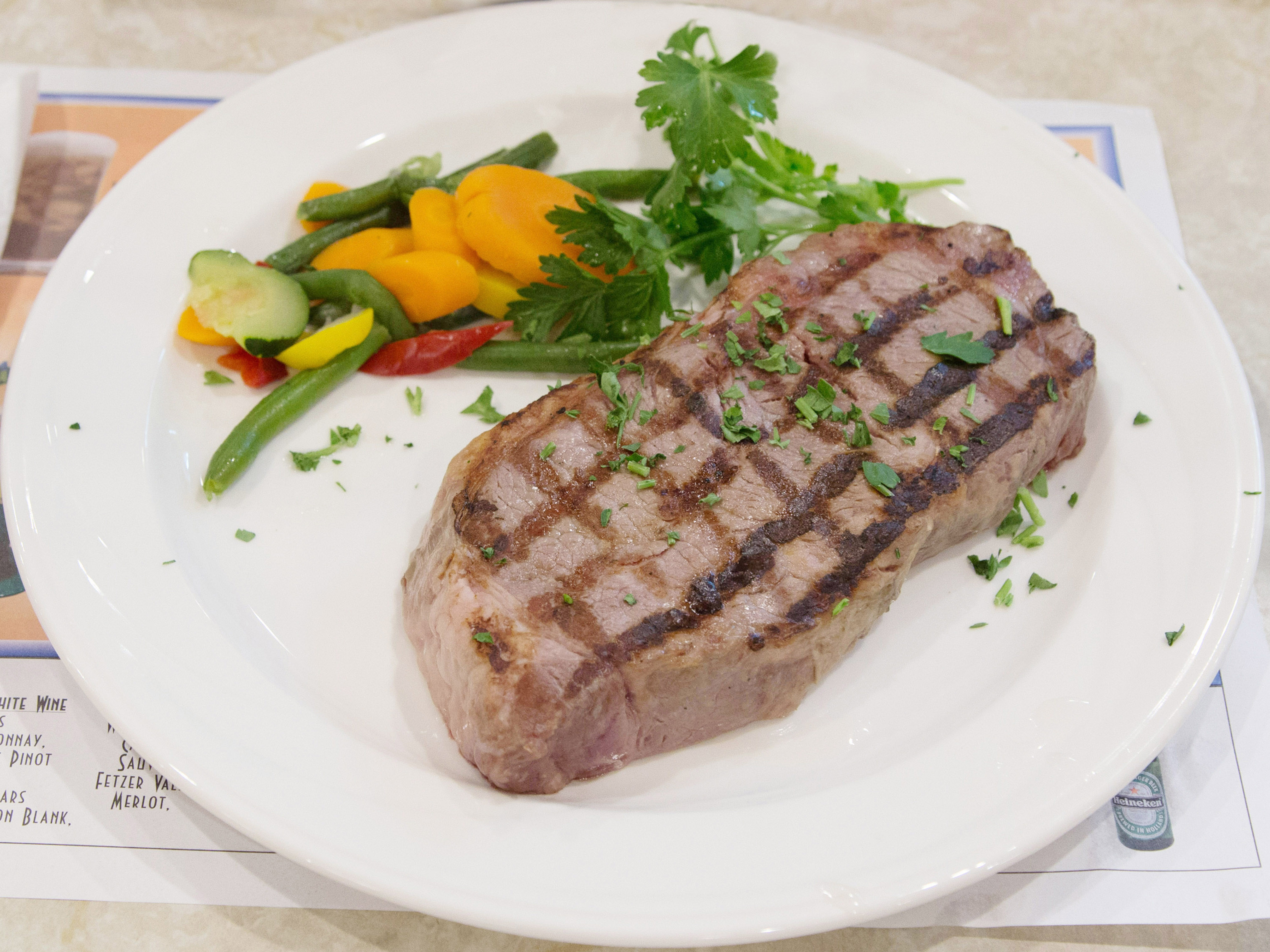 Order 16 oz. Broiled NY Cut Sirloin Steak food online from Seven Seas Reataurant store, Great Neck on bringmethat.com