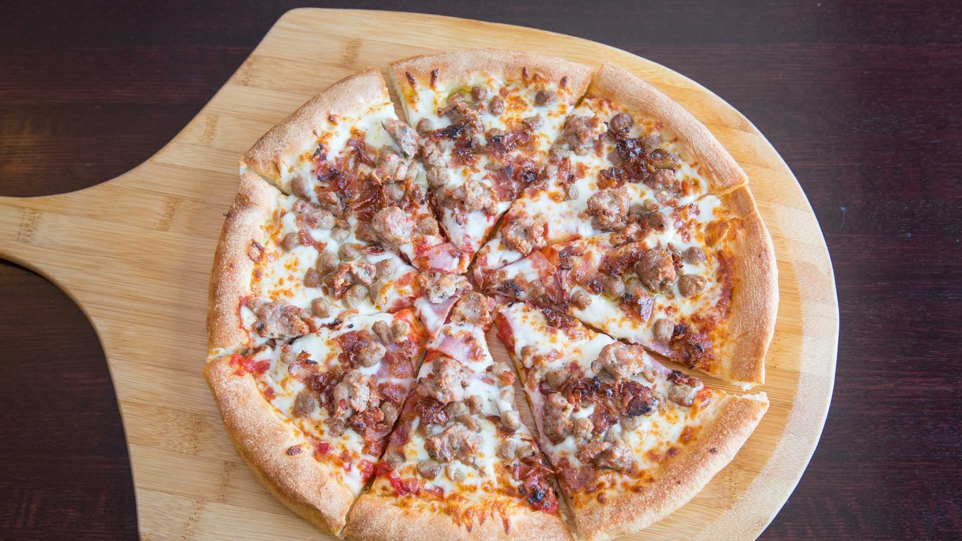 Order Meat Lover Pizza food online from Soprano's Pizza & Pasta store, Seattle on bringmethat.com