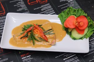 Order 26. Salmon Curry food online from Miko Thai Kitchen store, Hudson on bringmethat.com