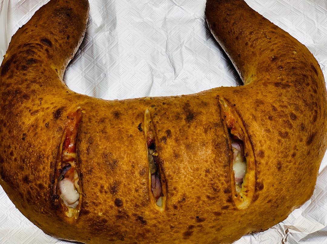 Order Meat Lover Stromboli food online from Lochearn Pizza store, Pikesville on bringmethat.com