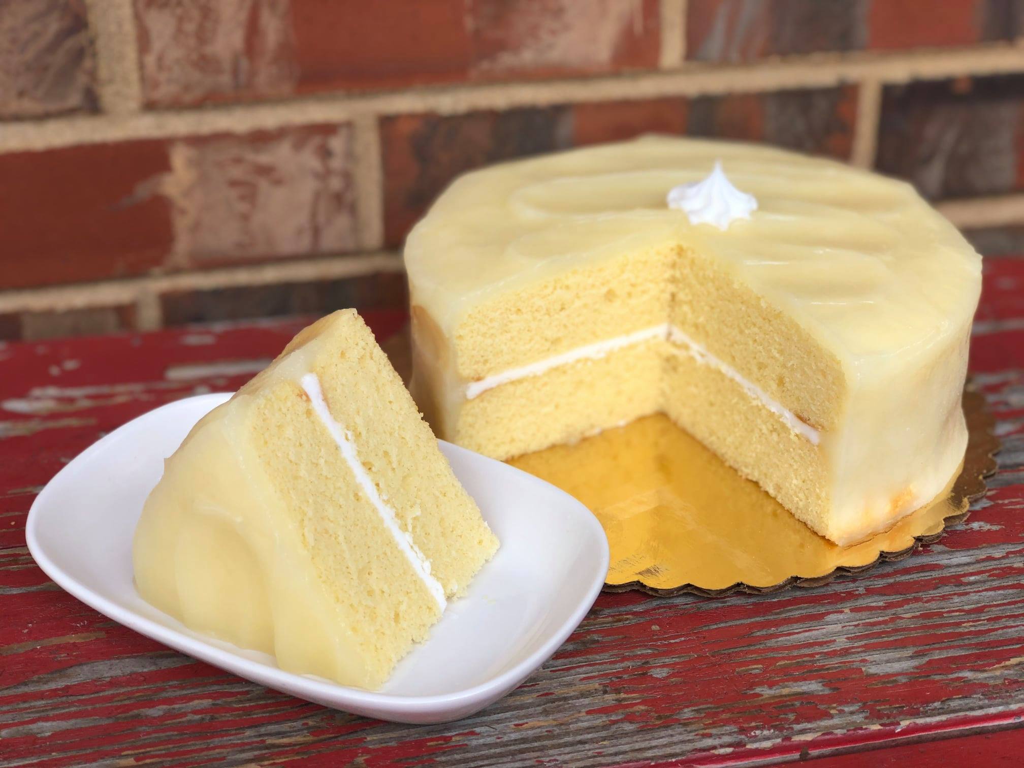 Order Lemon Cream Cake food online from Mcentyre's Bakery store, Dallas on bringmethat.com