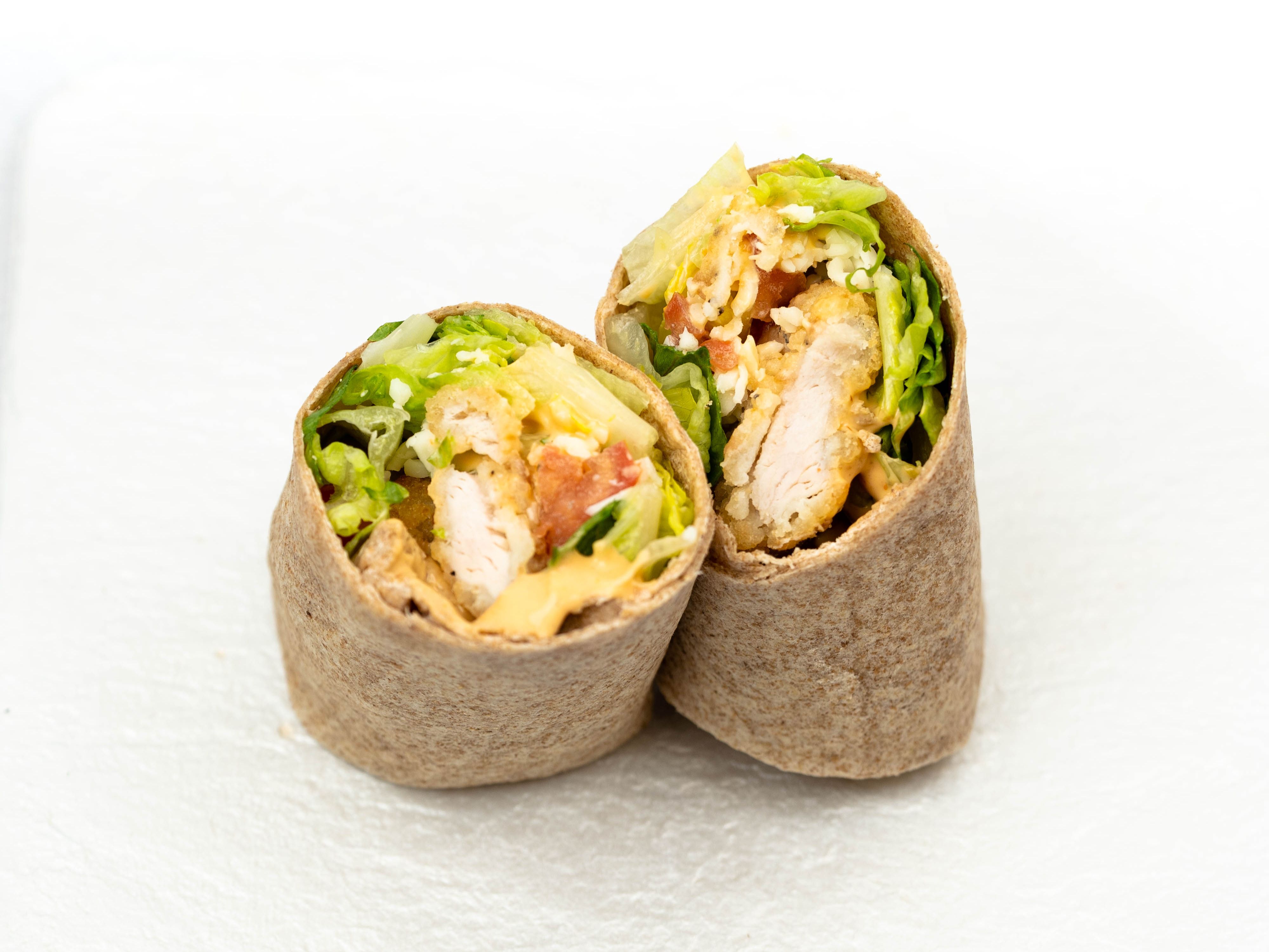 Order BUFFALO CHICKEN WRAP 2022 food online from Clean Eatz store, Columbia on bringmethat.com